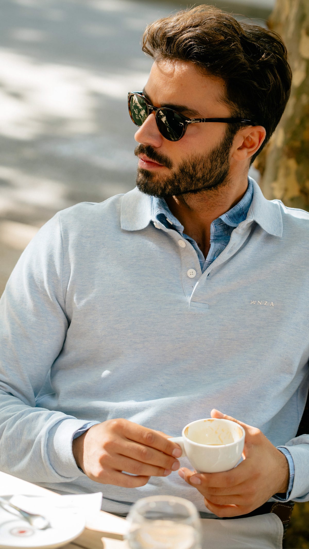 Hellblaues Poloshirt mit langen Ärmeln - Marble Blue