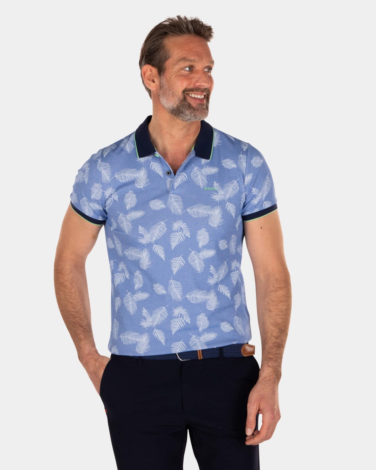 Polo bleu imprimé feuilles