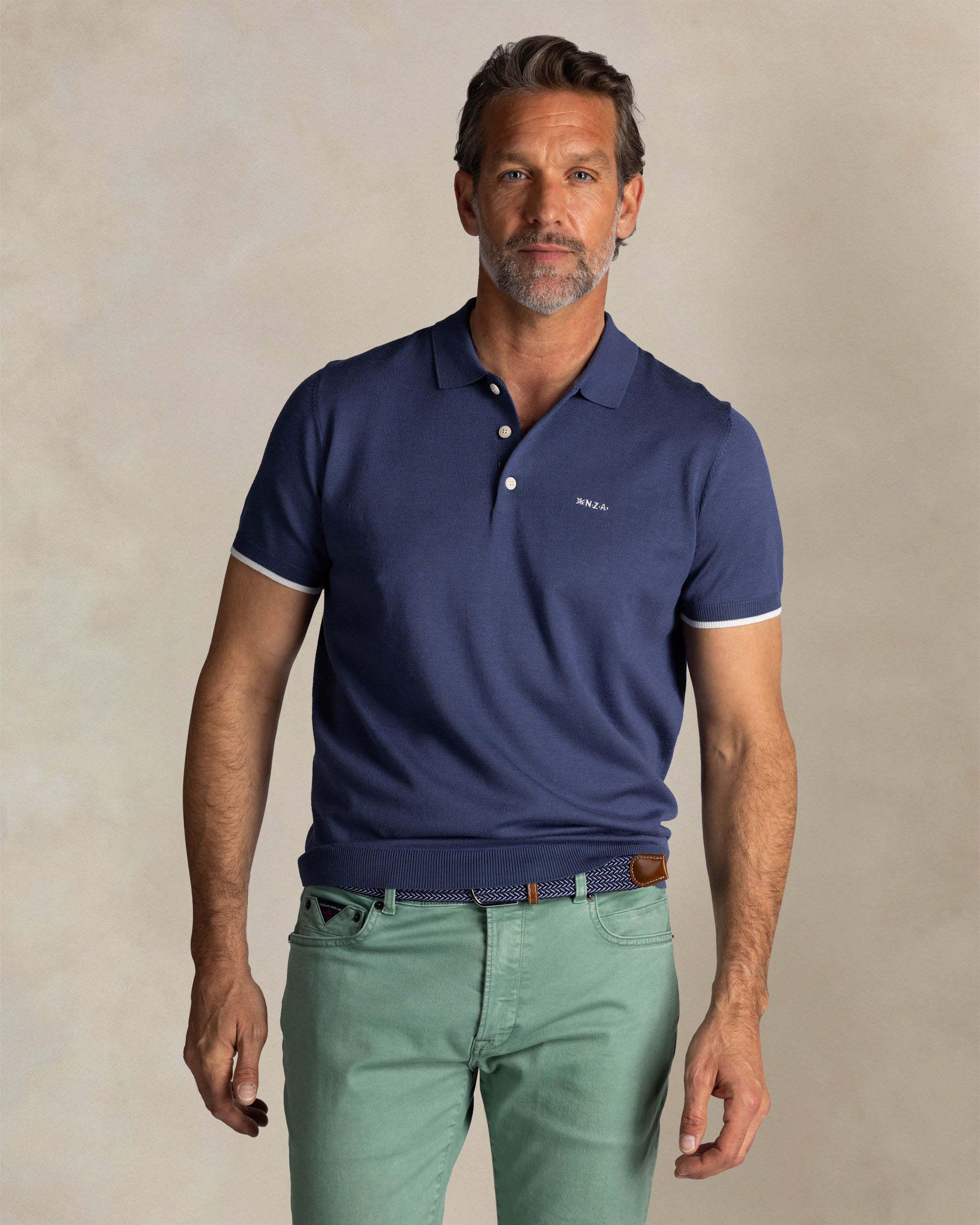 Blauw gestricktes Polo-Shirt Blauw gestricktes Polo-Shirt