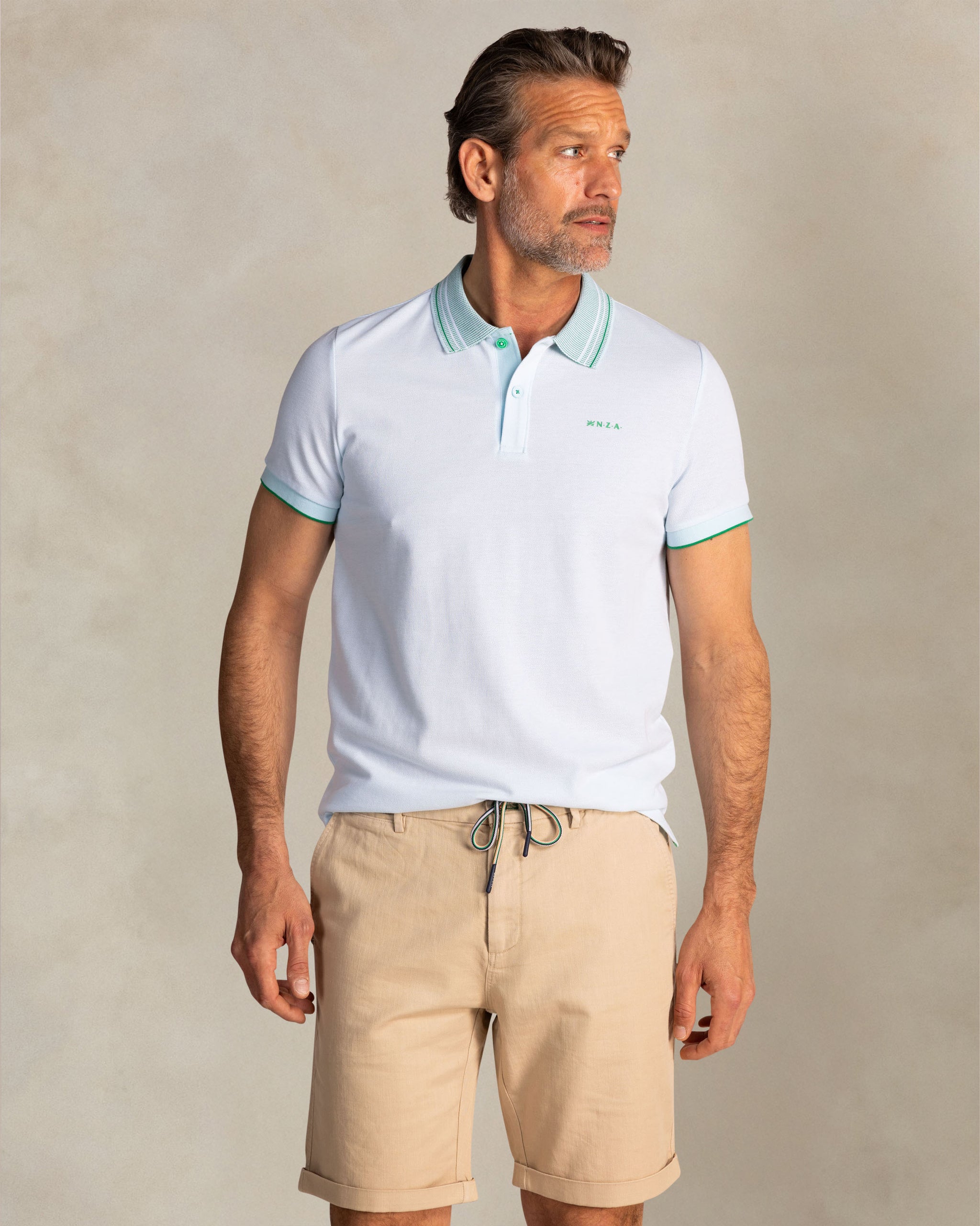 Light blue polo with striped collar Light blue polo with striped collar