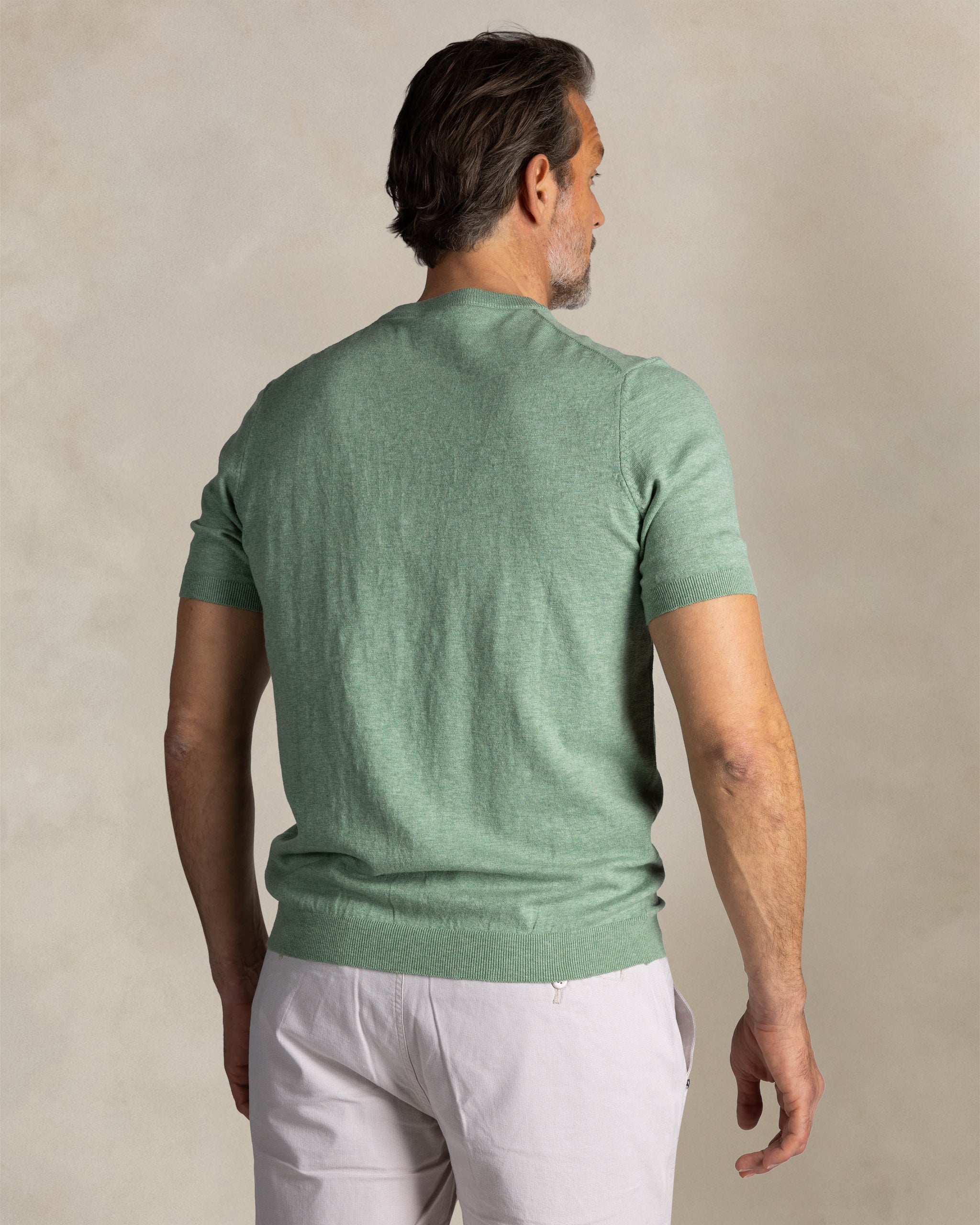 Grünes Baumwollstrickshirt Grünes Baumwollstrickshirt