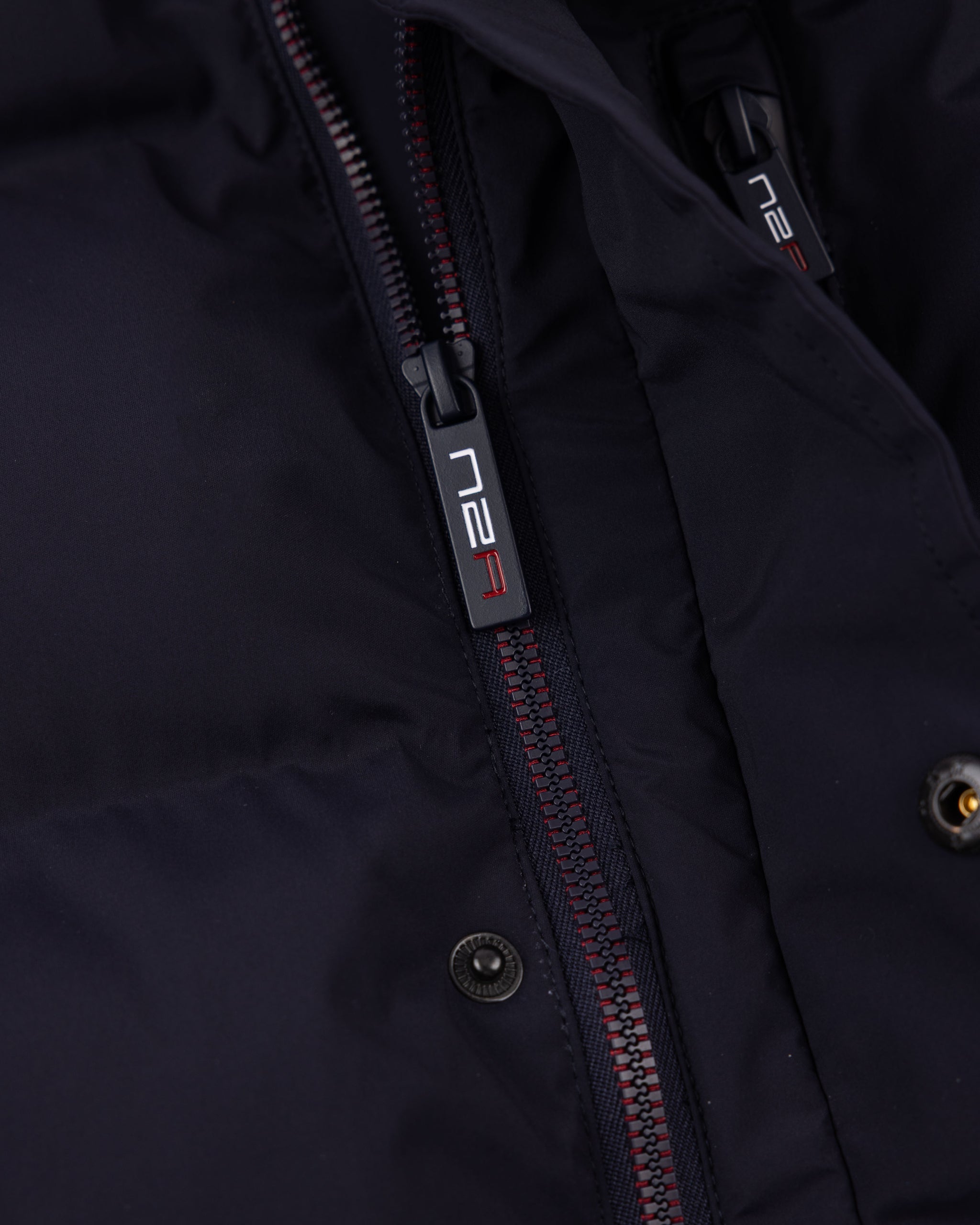 Blauwe gewatteerde jas Blauwe gewatteerde jas