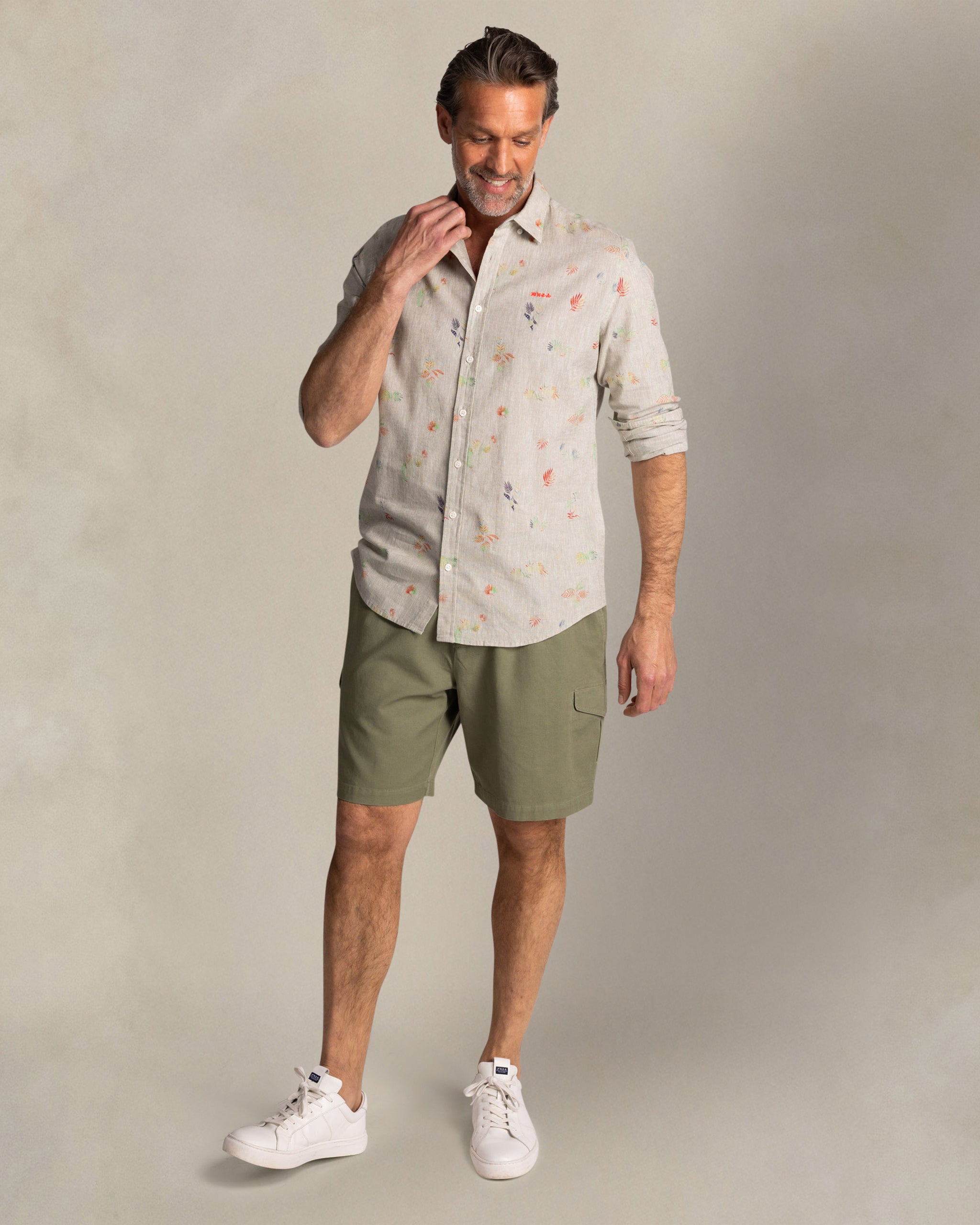 Taupe shirt with colorful floral print Taupe shirt with colorful floral print