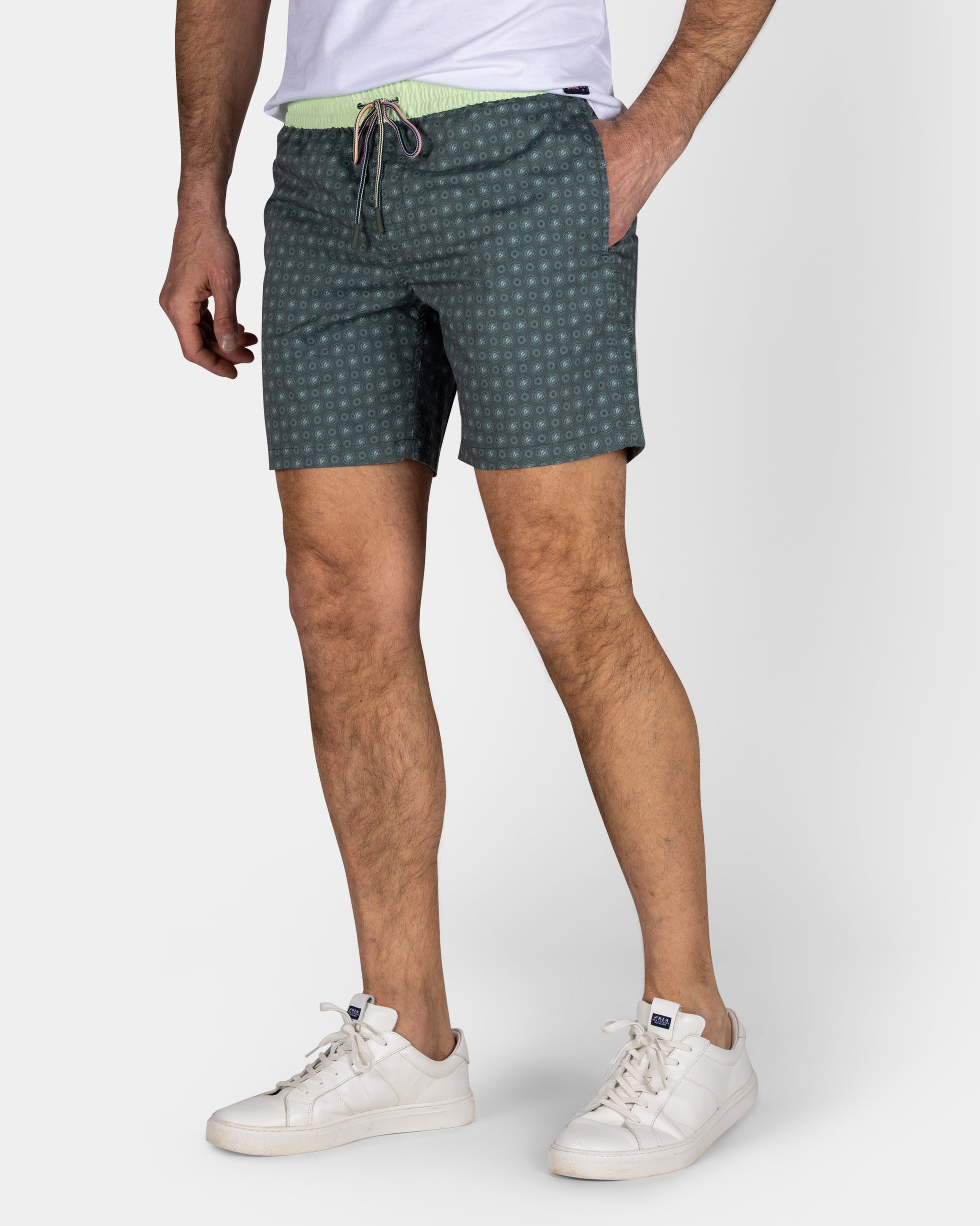 Groene zwembroek met print en lichtgele details Groene zwembroek met print en lichtgele details