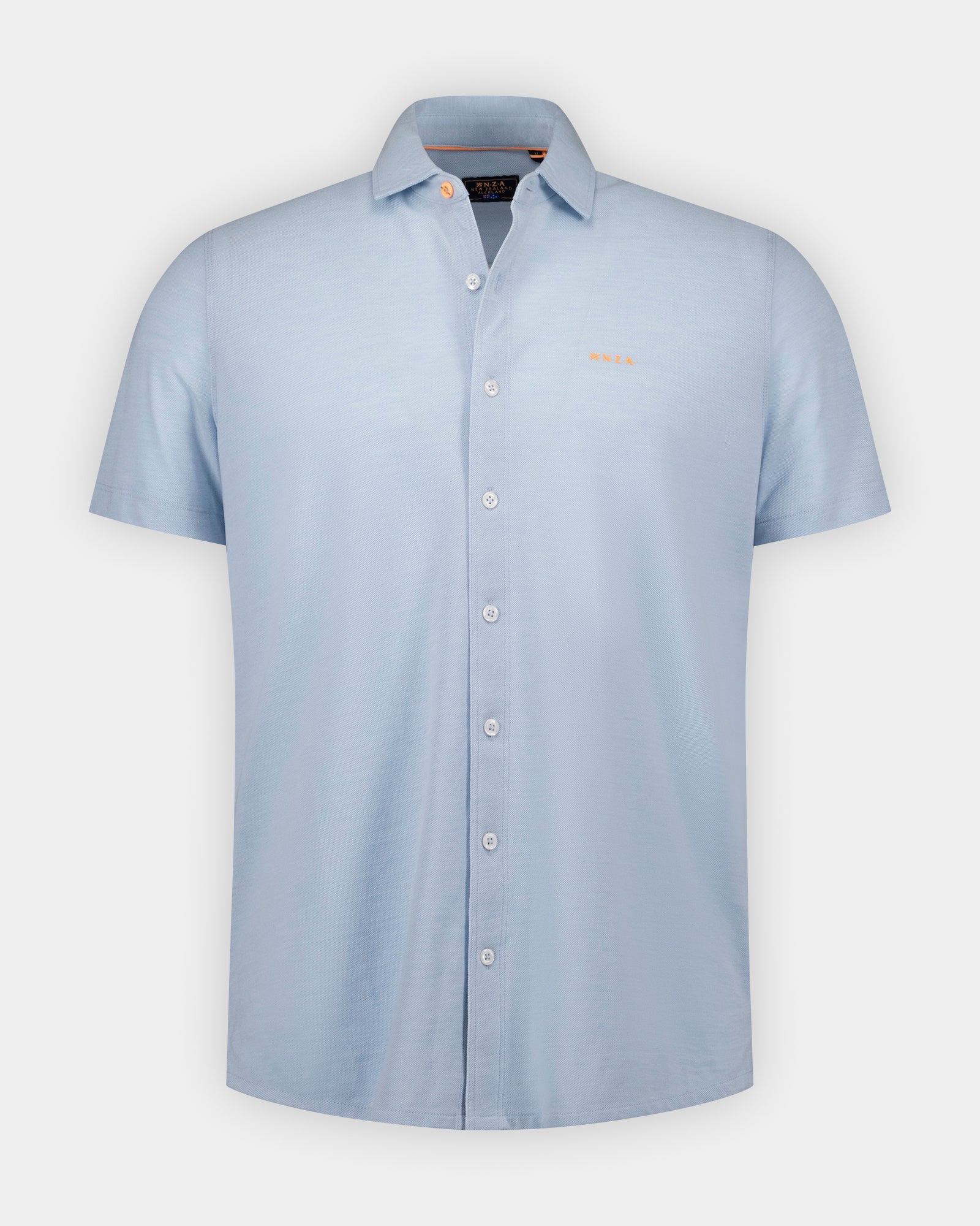 Blauwe katoenen piqué overhemd Blauwe katoenen piqué overhemd