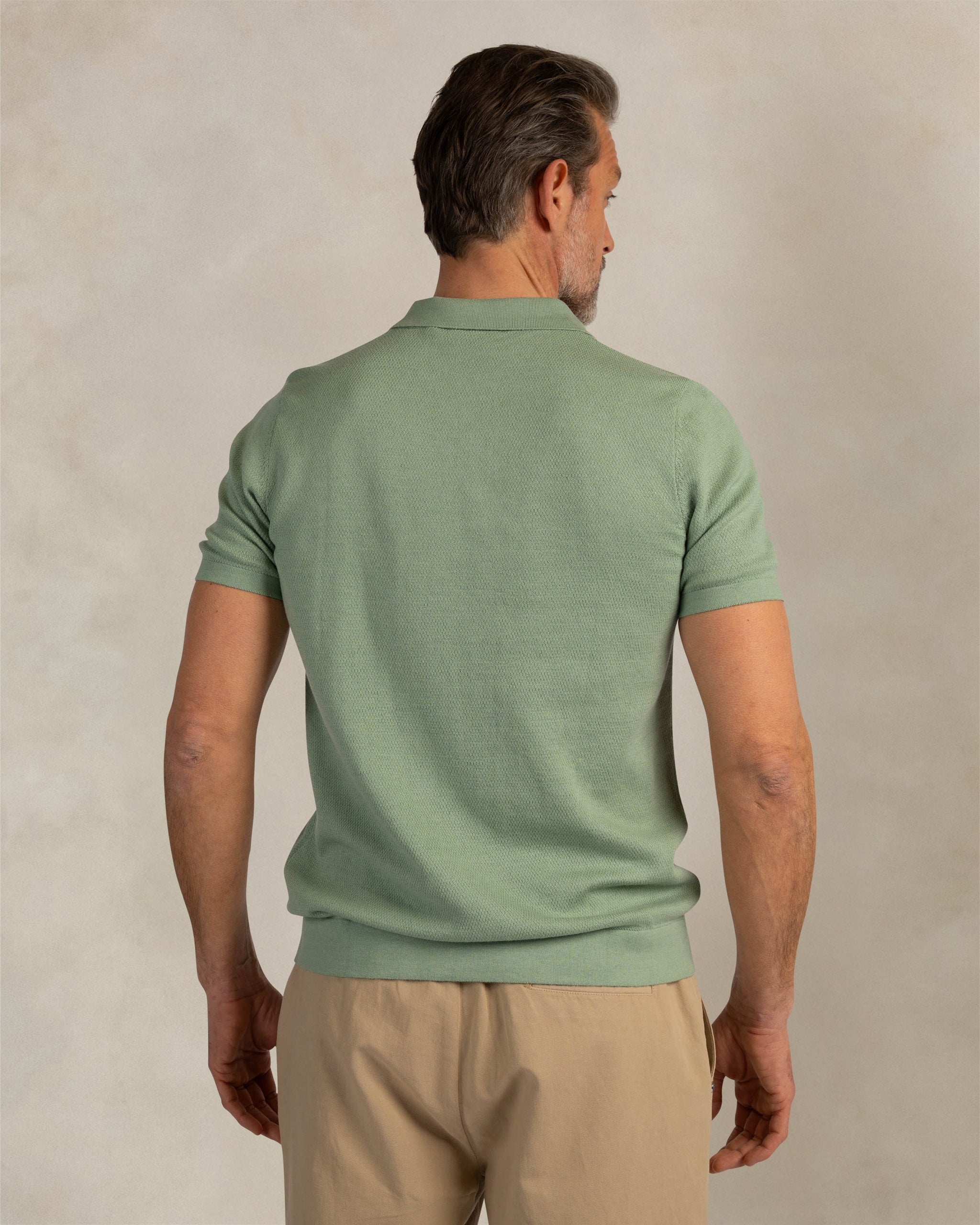 Groene gebreide polo katoen linnen Groene gebreide polo katoen linnen