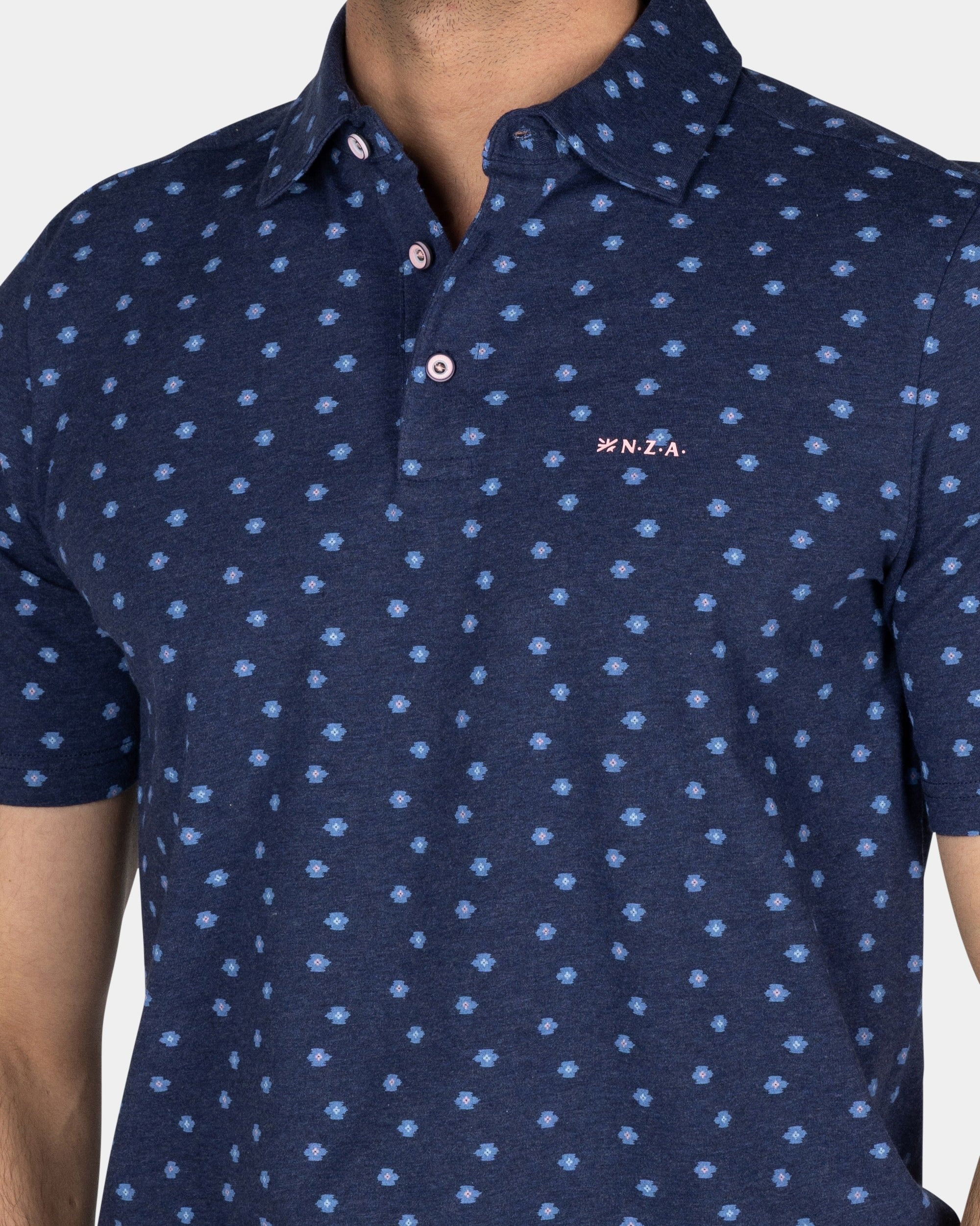 Cotton Blue Polo with a print of small polka dots Cotton Blue Polo with a print of small polka dots