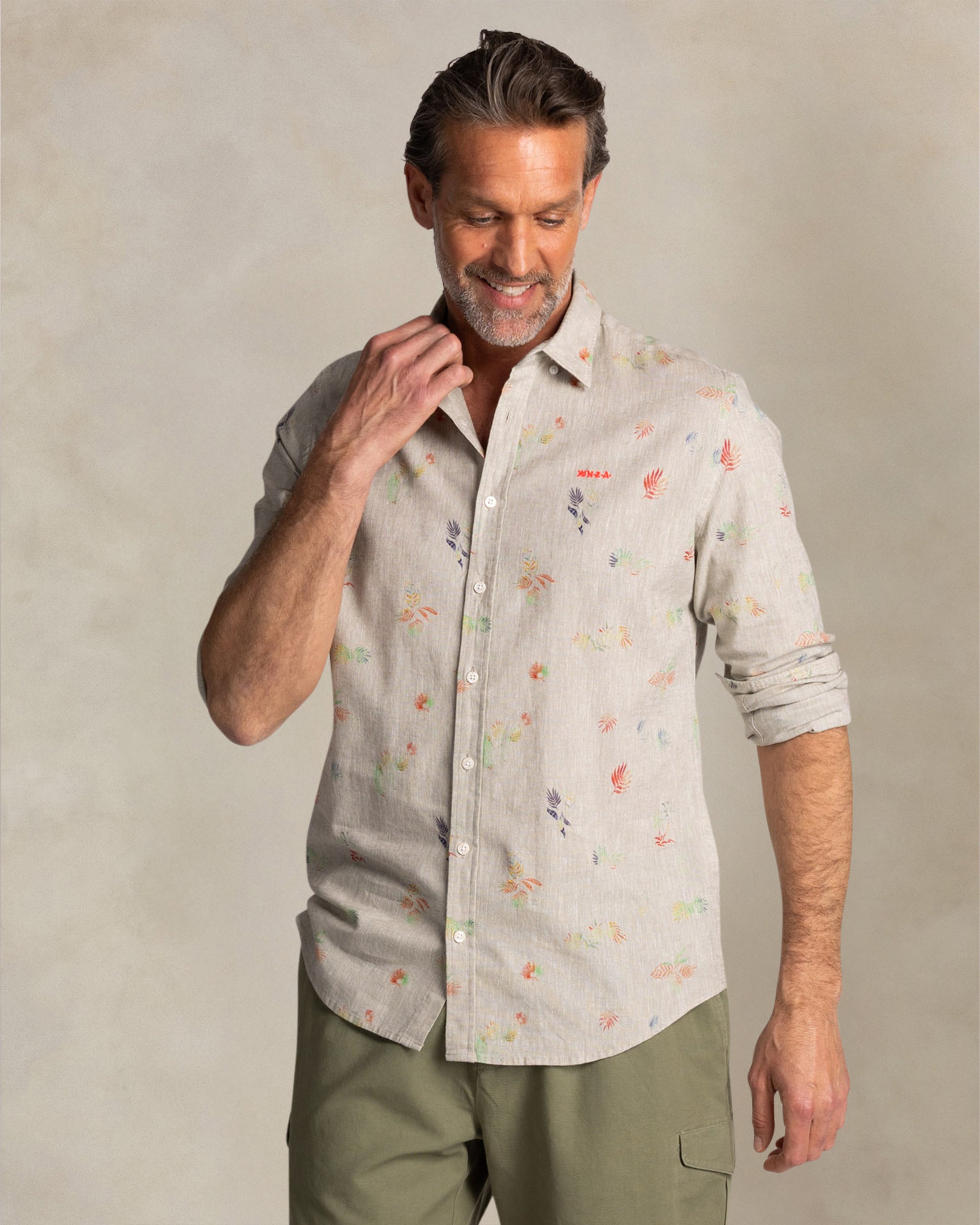 Taupe shirt with colorful floral print Taupe shirt with colorful floral print