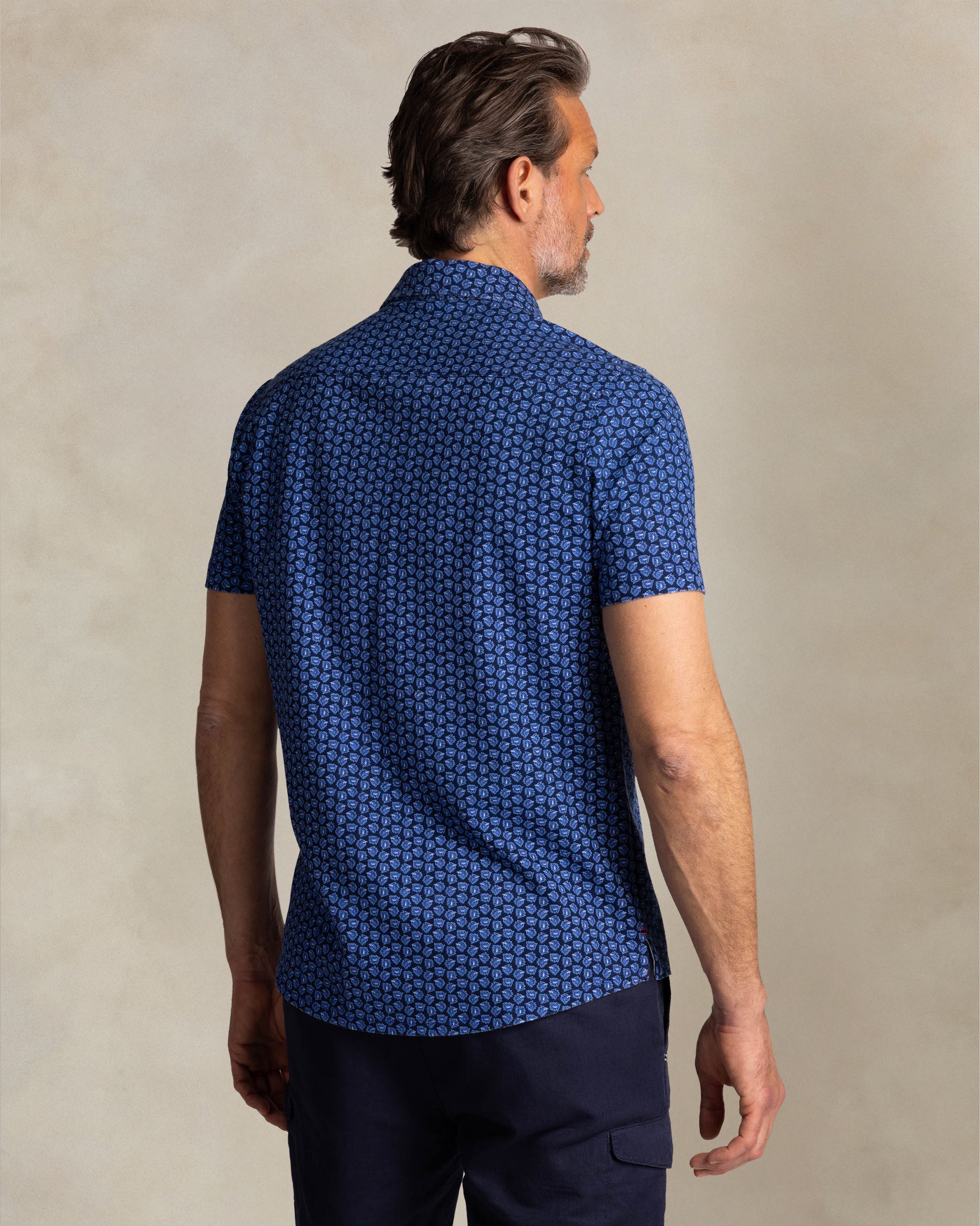 Blue shirt with small white dots Blue shirt with small white dots
