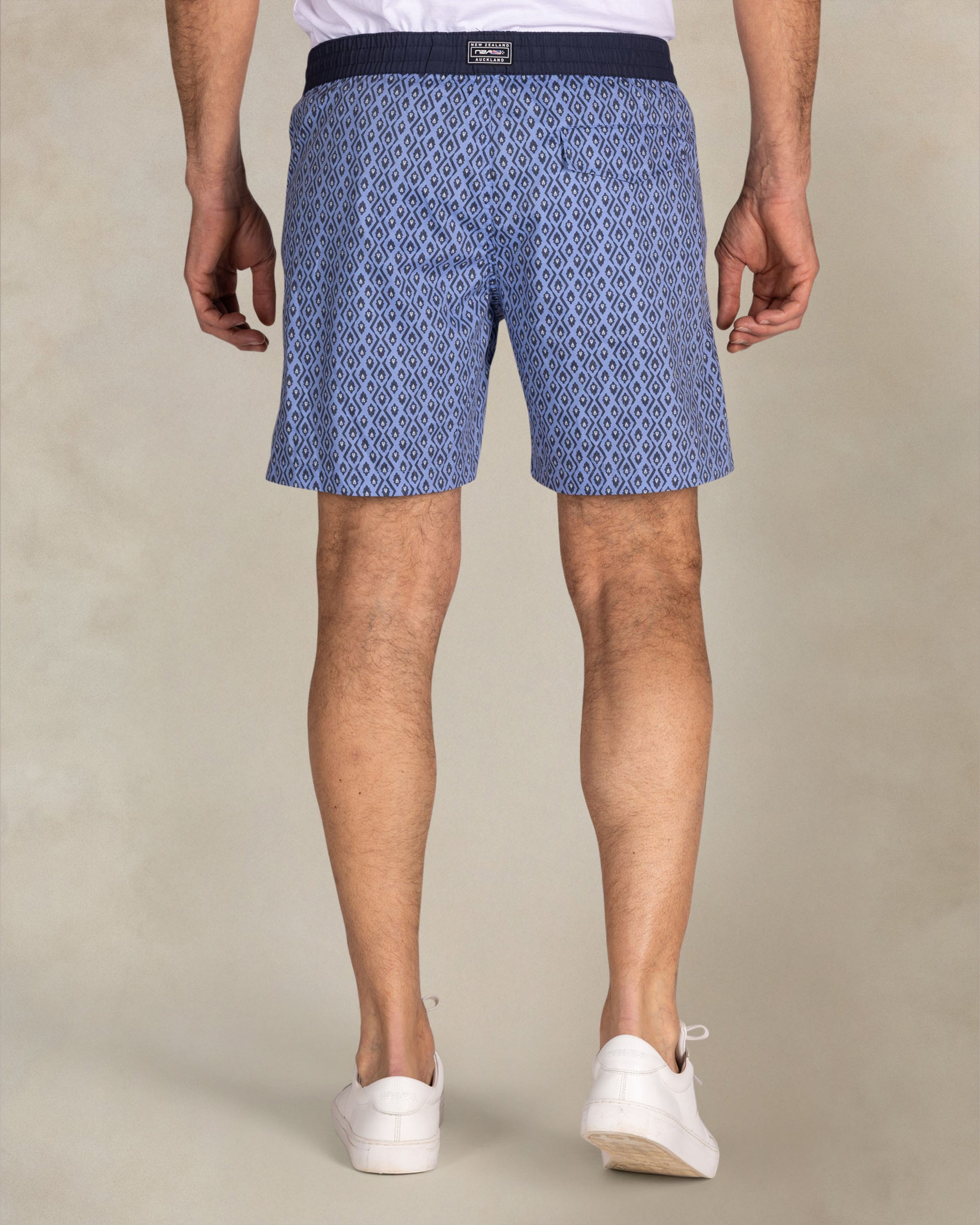 Blauwe geprinte zwembroek met navy rand Blauwe geprinte zwembroek met navy rand