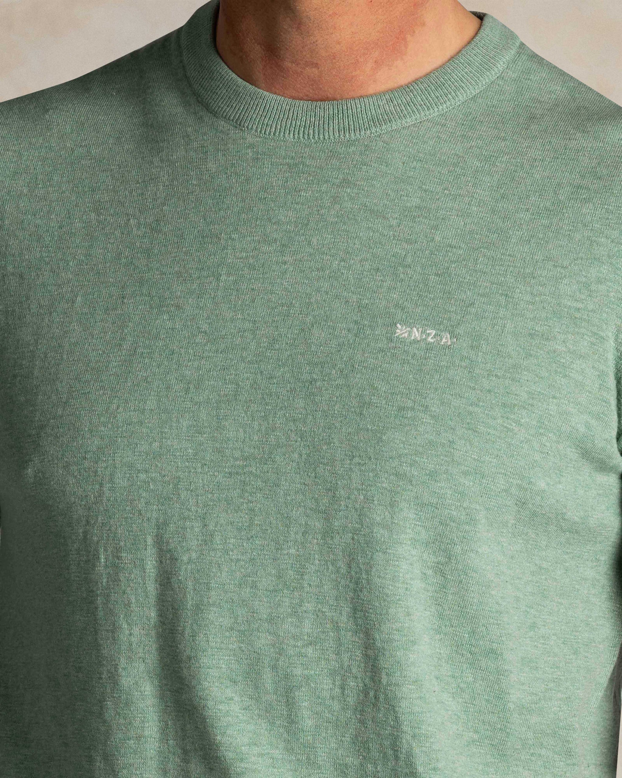 Grünes Baumwollstrickshirt Grünes Baumwollstrickshirt