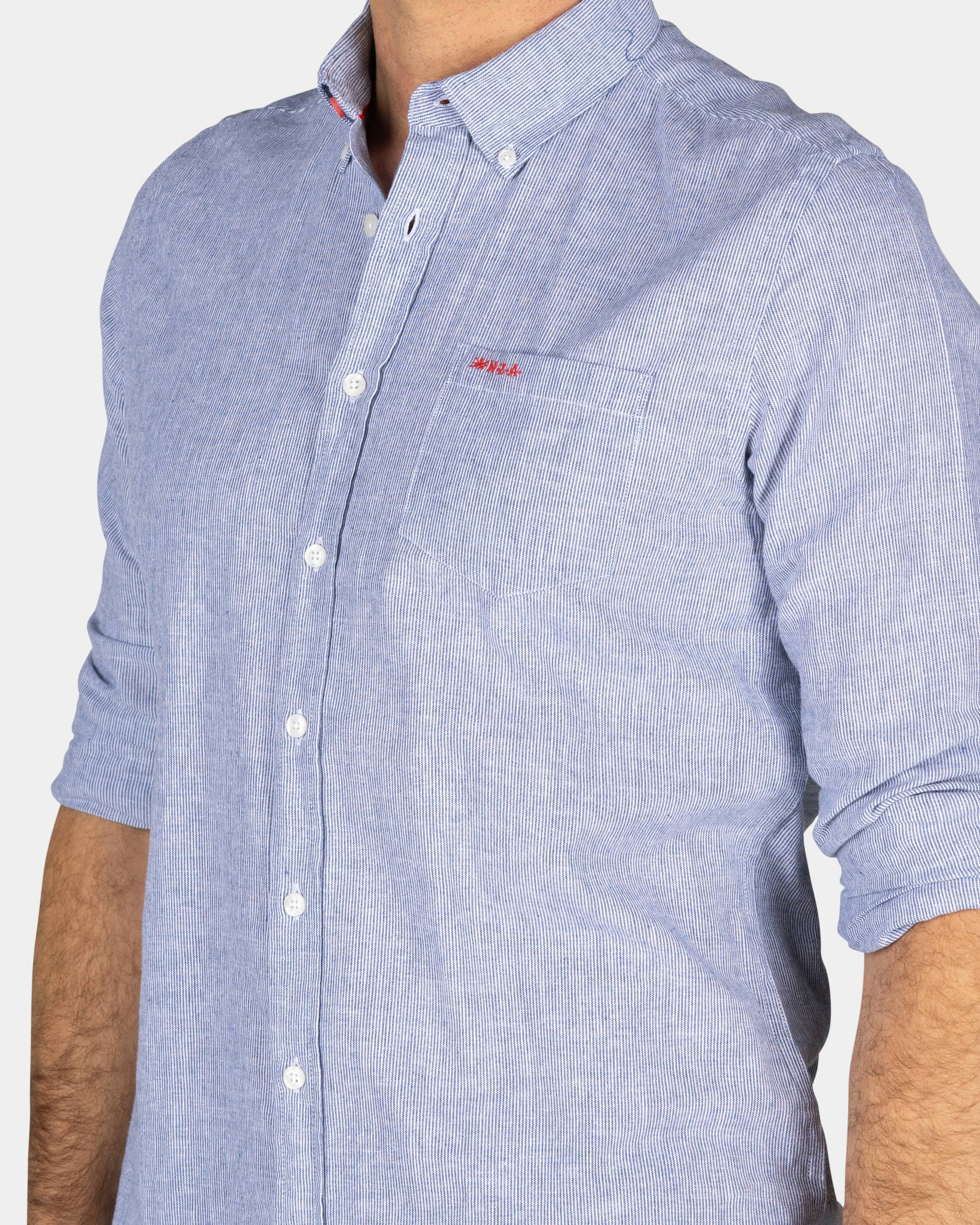 Camisa de lino azul Camisa de lino azul