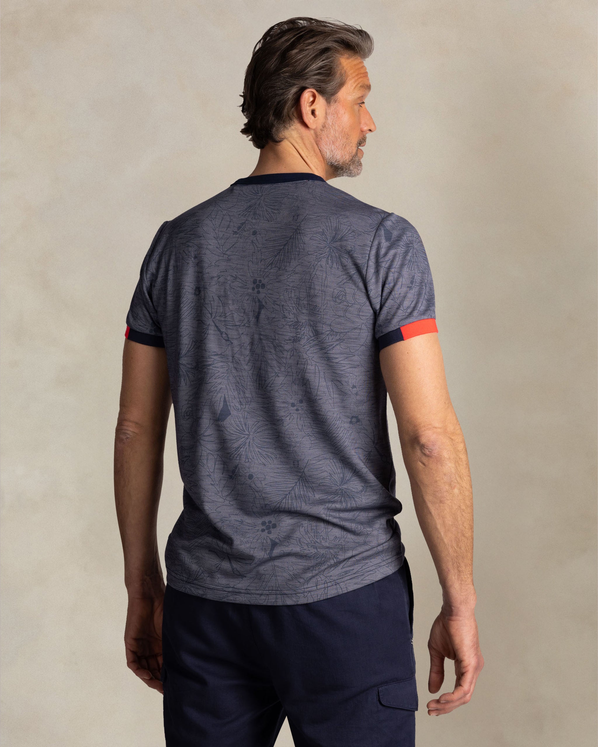 Blue round-neck T-shirt with leaf print Blue round-neck T-shirt with leaf print