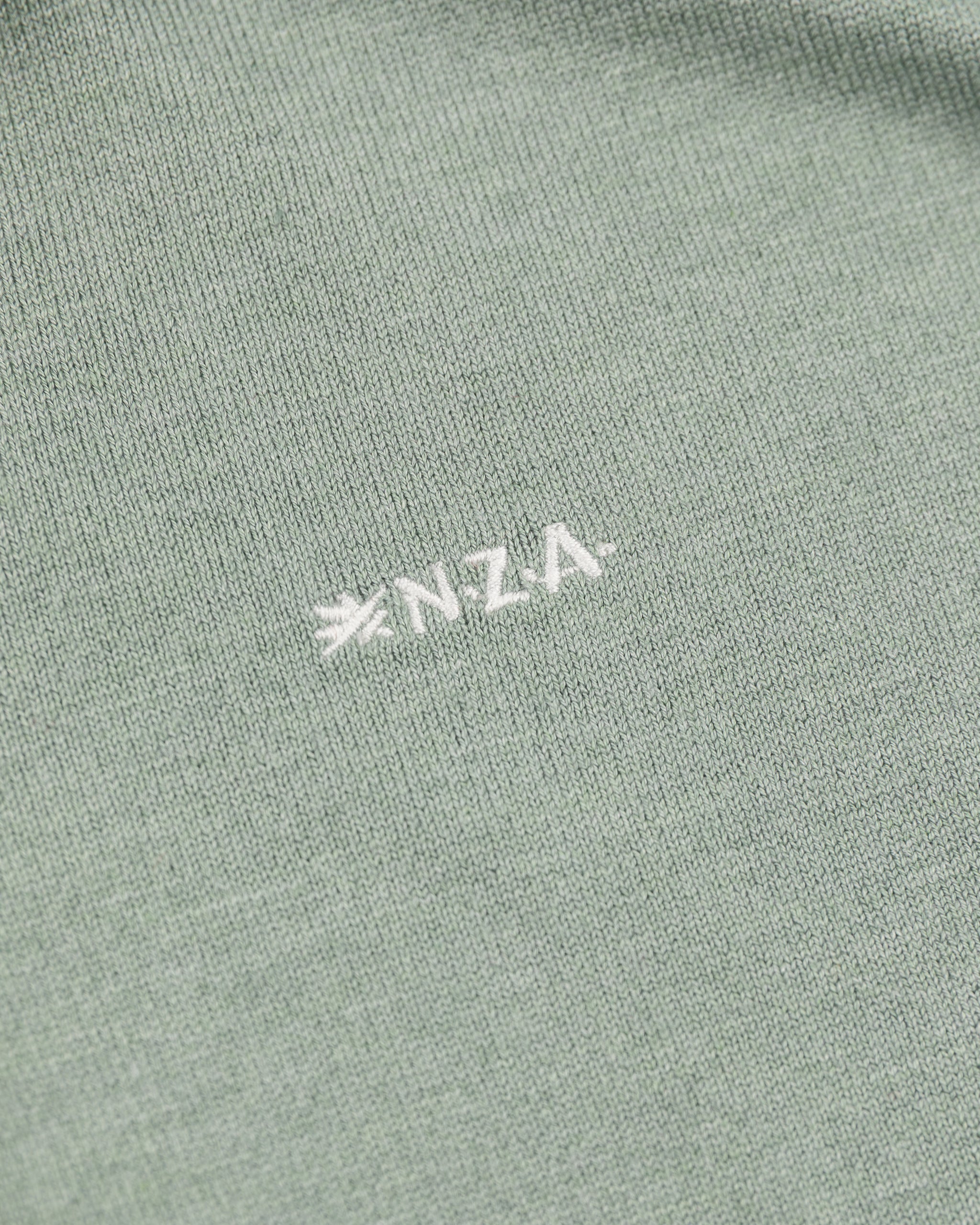 Polo vert avec dホtails blancs - Sage Polo vert avec dホtails blancs - Sage