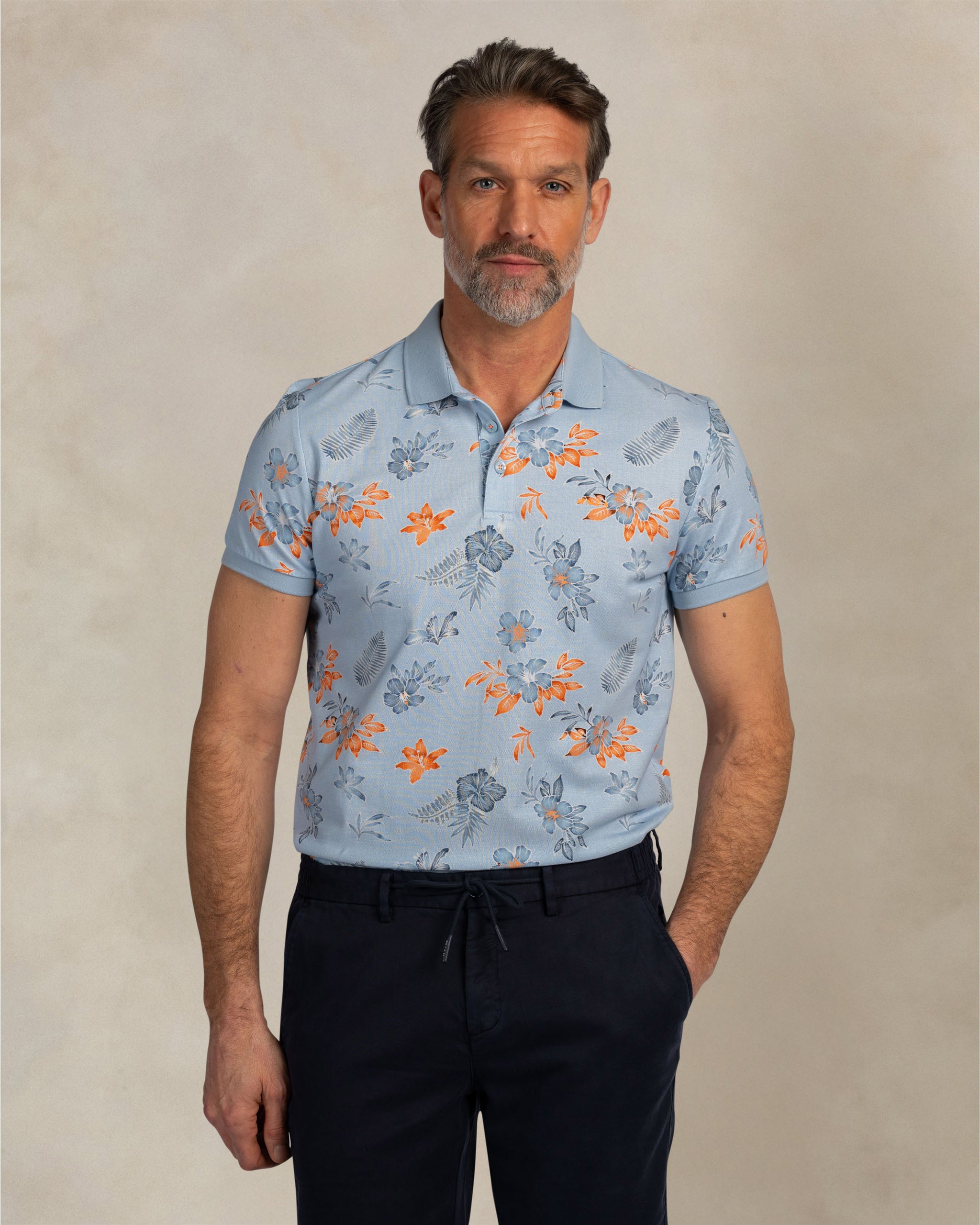 Polo azul claro 100% algodón con estampado Polo azul claro 100% algodón con estampado