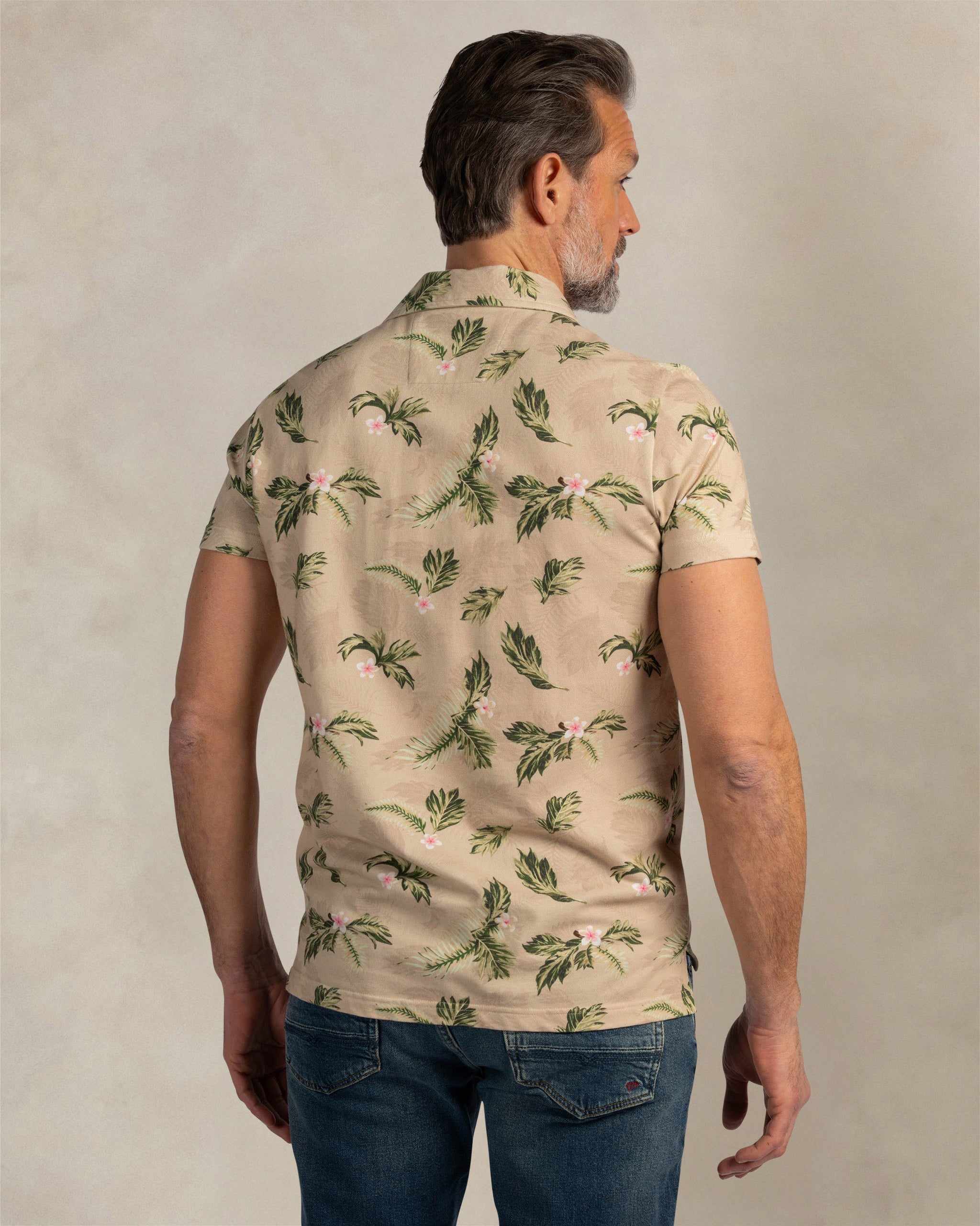 Ecru katoenen polo met print Ecru katoenen polo met print