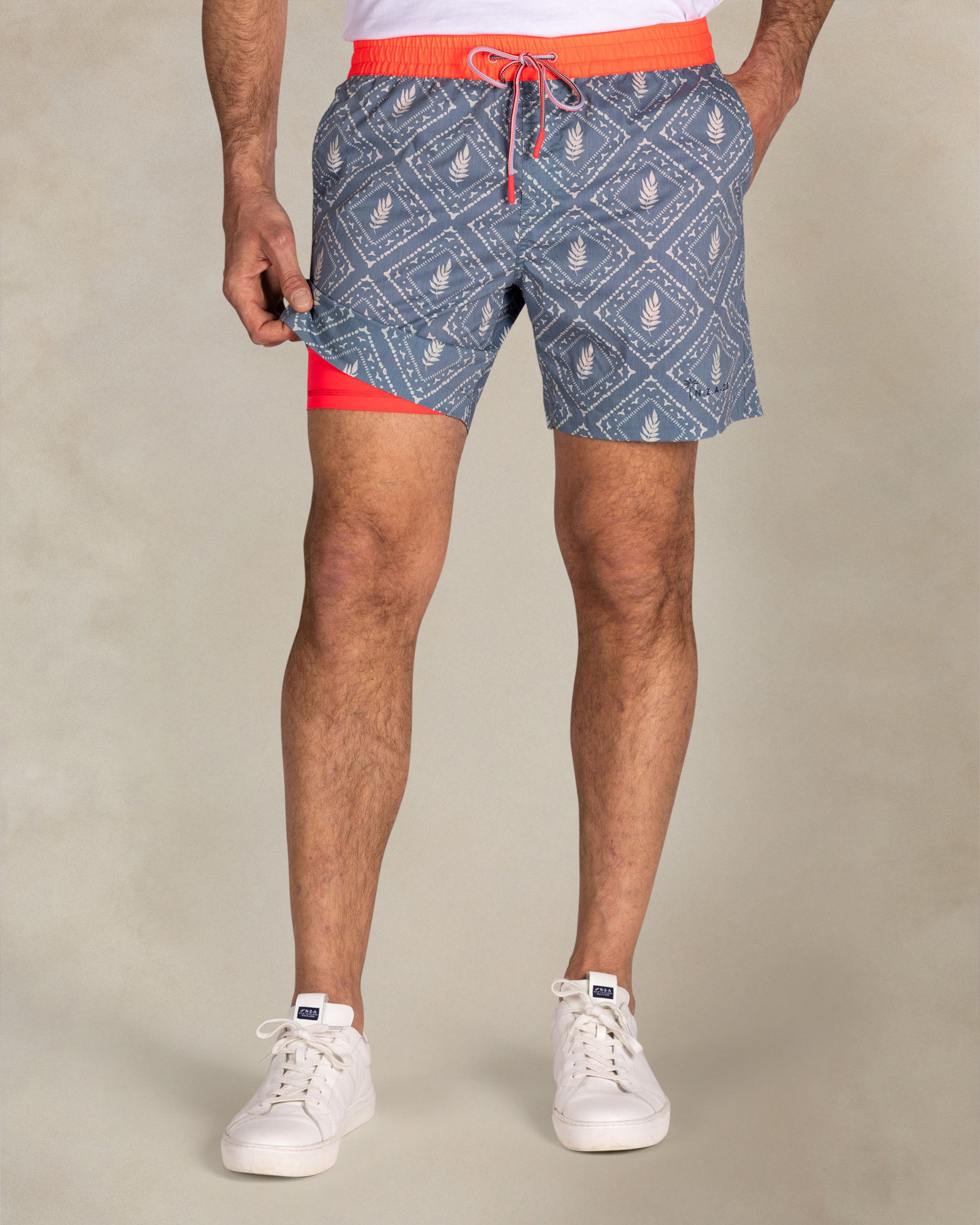 Blue printed swim shorts with red trim Blue printed swim shorts with red trim