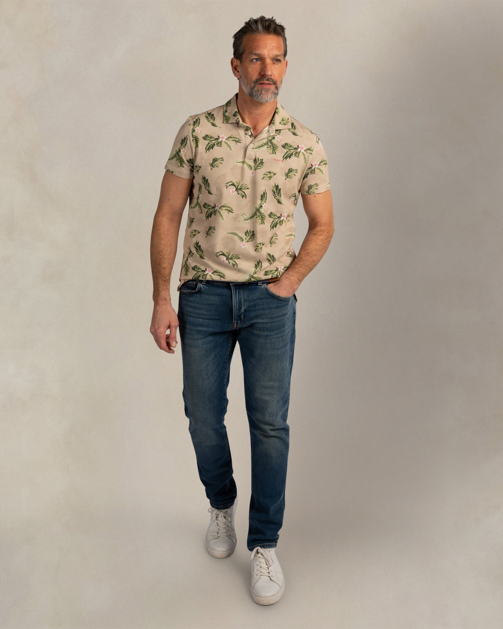 Ecru katoenen polo met print Ecru katoenen polo met print