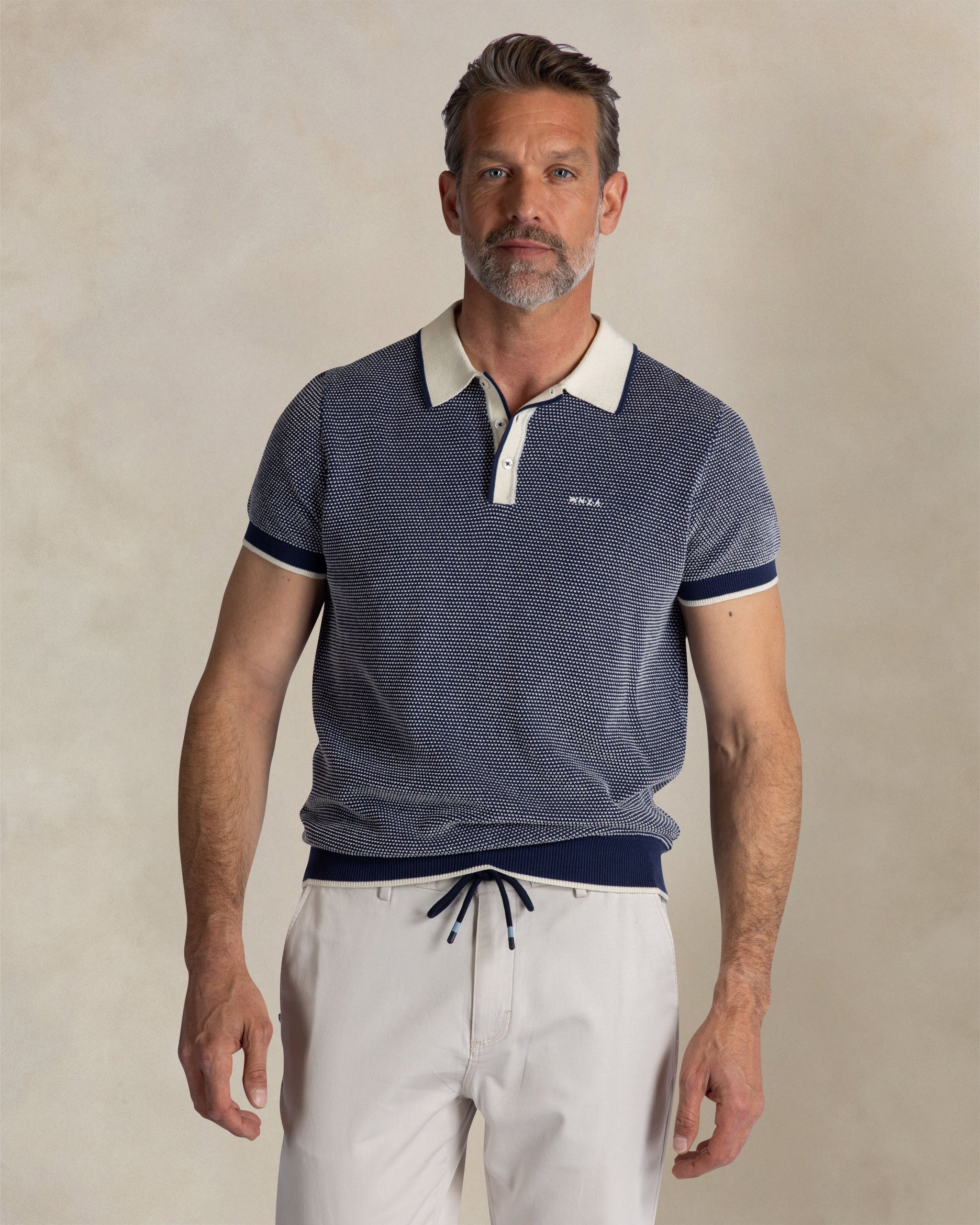 Blaue gestrickte Baumwollpolo Blaue gestrickte Baumwollpolo