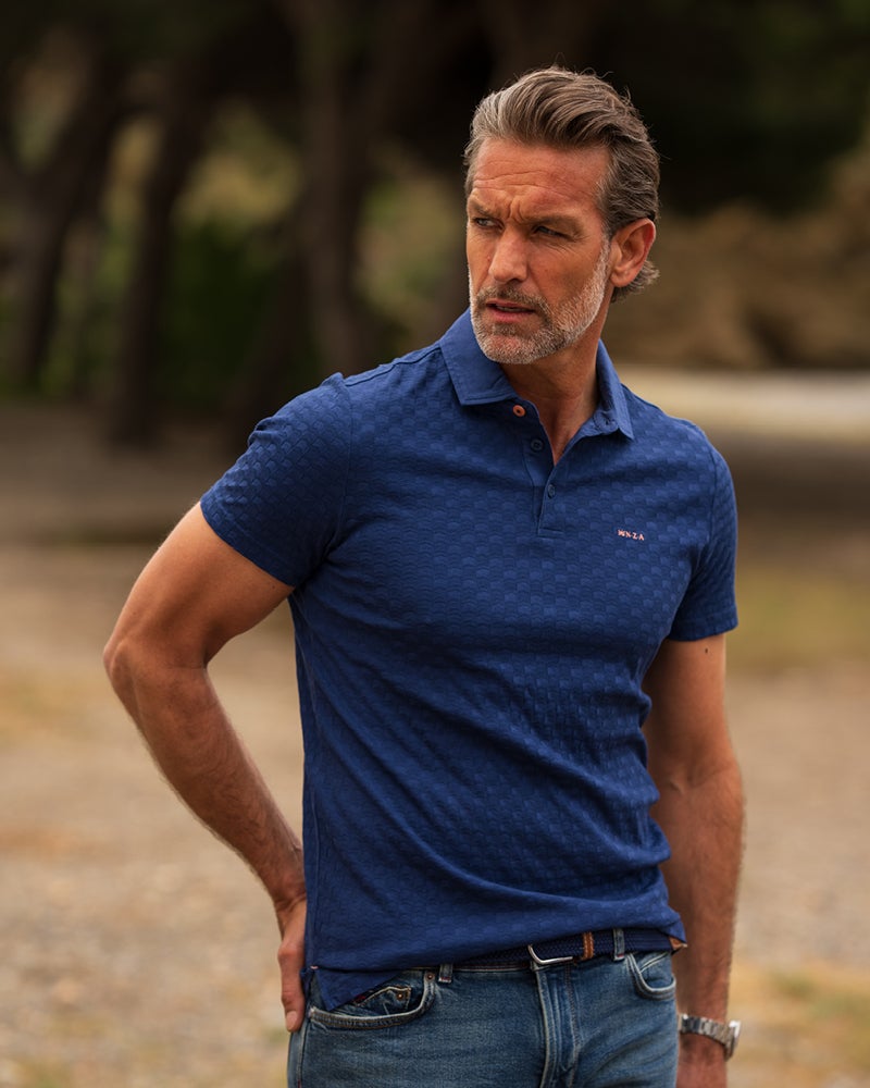 Blauwe 100% katoenen polo Blauwe 100% katoenen polo