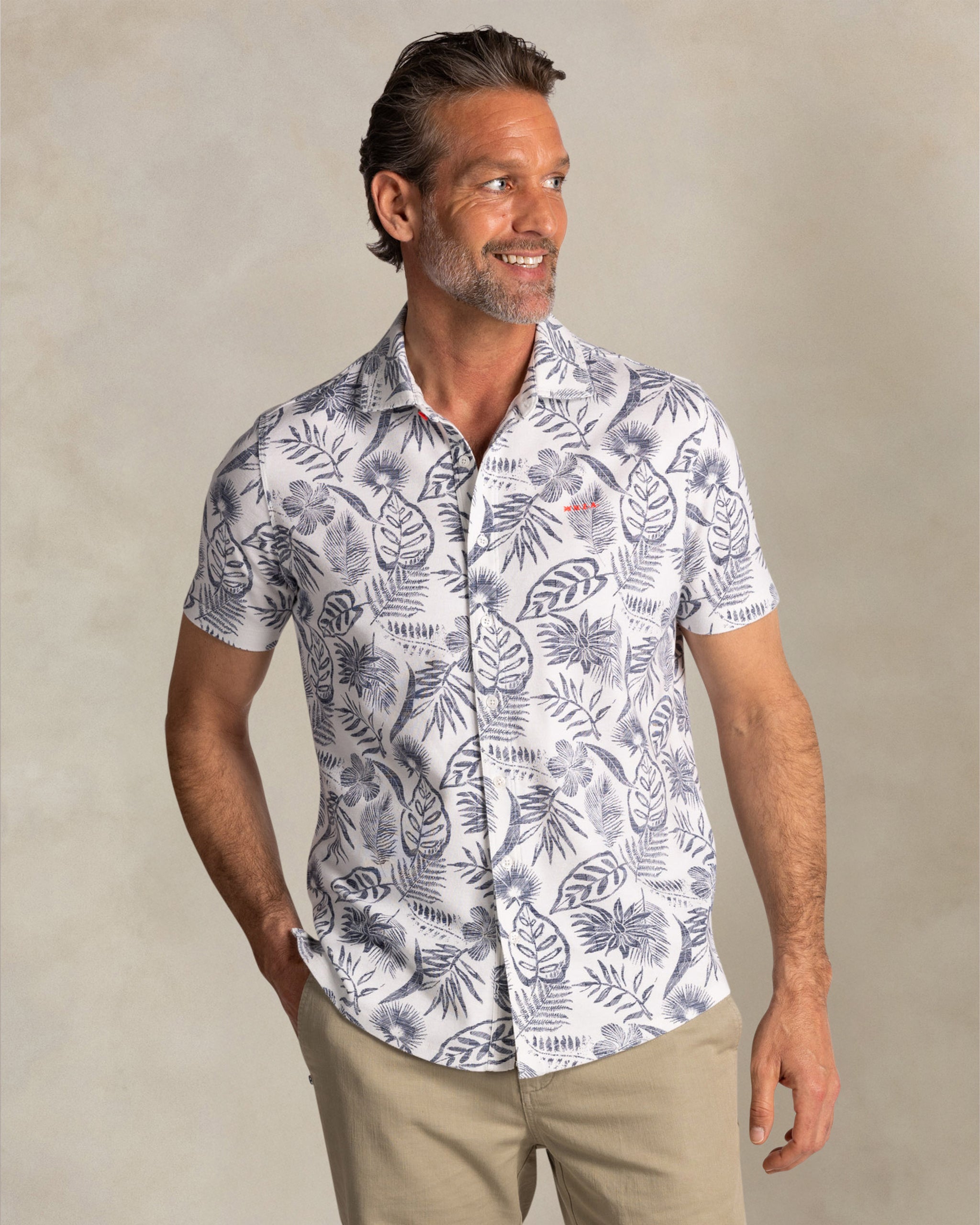 Beige shirt with navy floral print Beige shirt with navy floral print