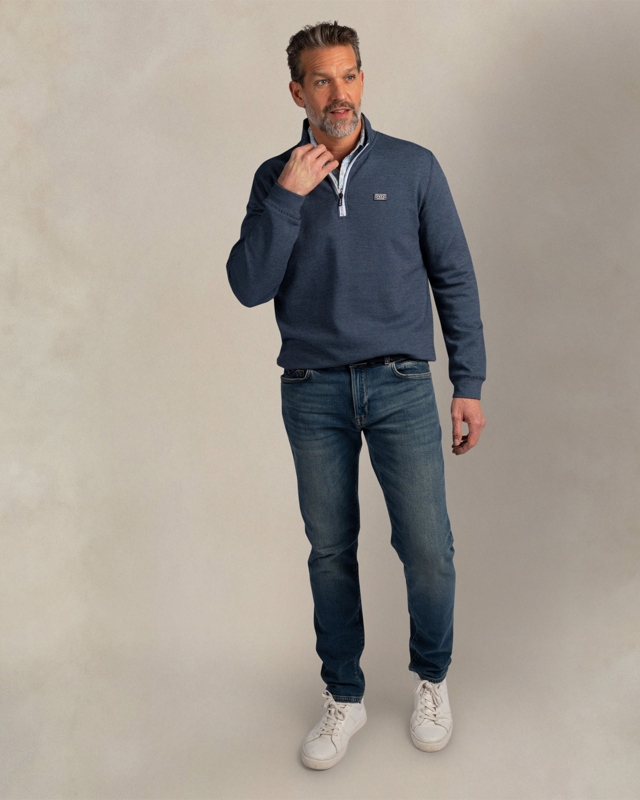 Blauwe katoenen quarter zip sweater Blauwe katoenen quarter zip sweater