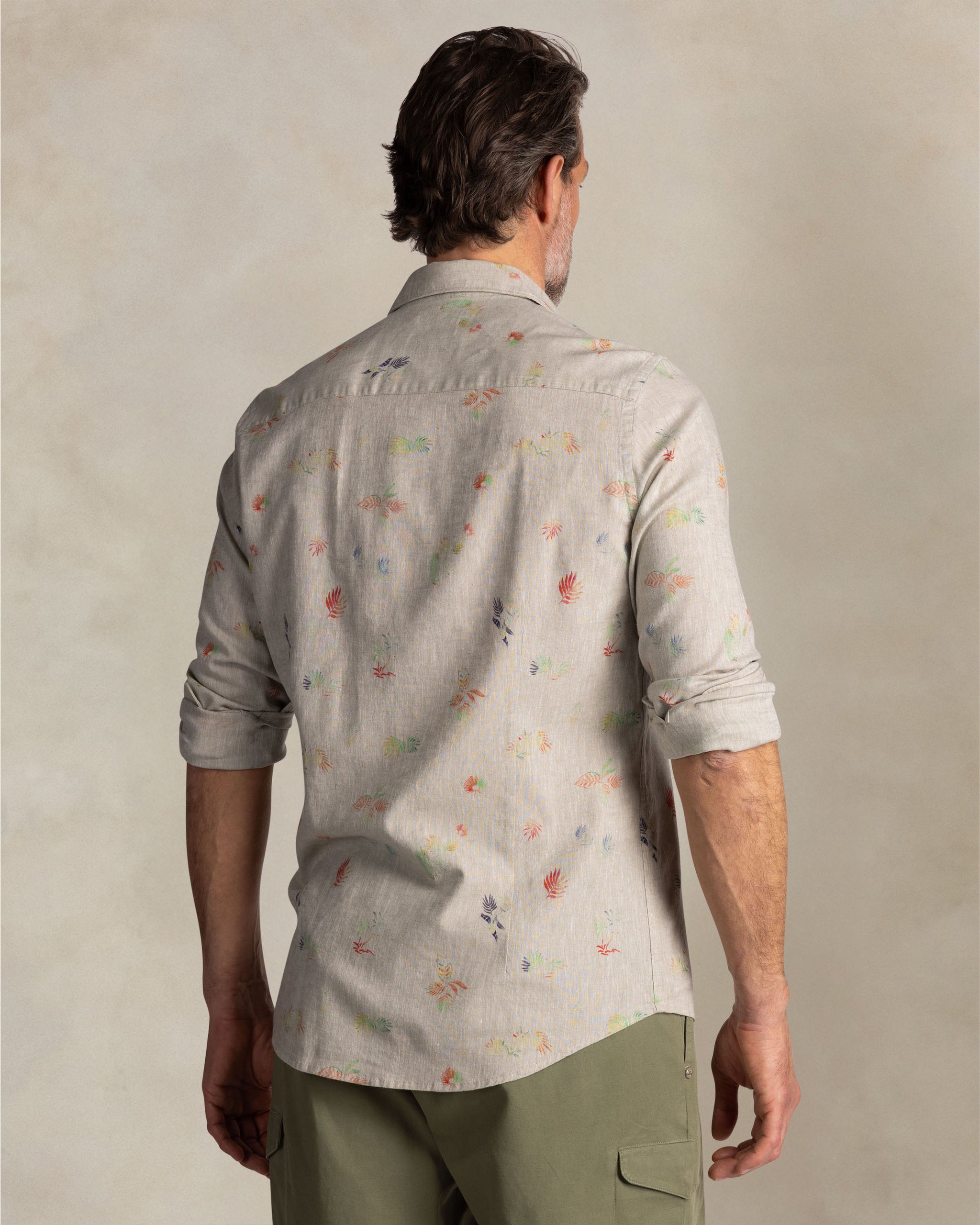 Taupe shirt with colorful floral print Taupe shirt with colorful floral print