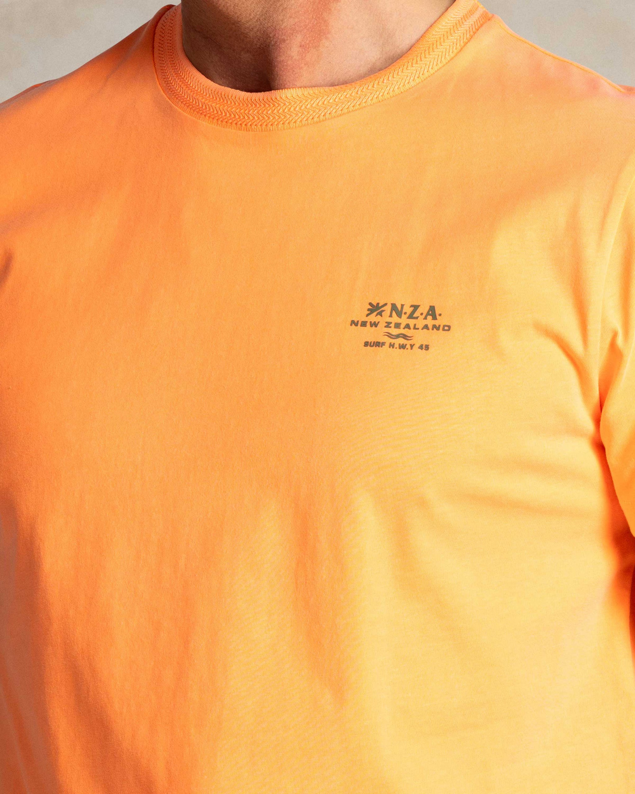 Camiseta lisa naranja de algodón con cuello redondo Camiseta lisa naranja de algodón con cuello redondo