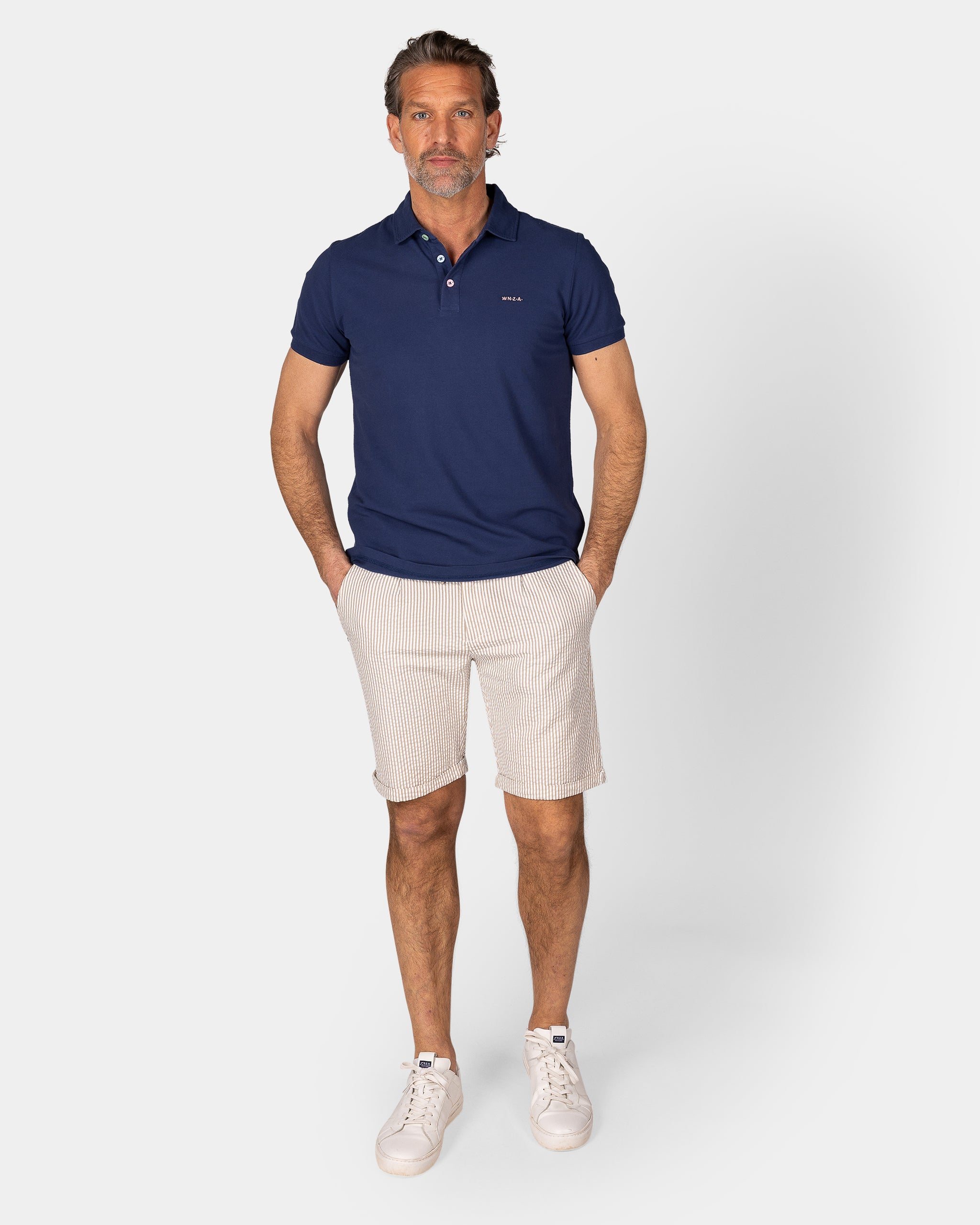 Polo uni en coton bleu Polo uni en coton bleu