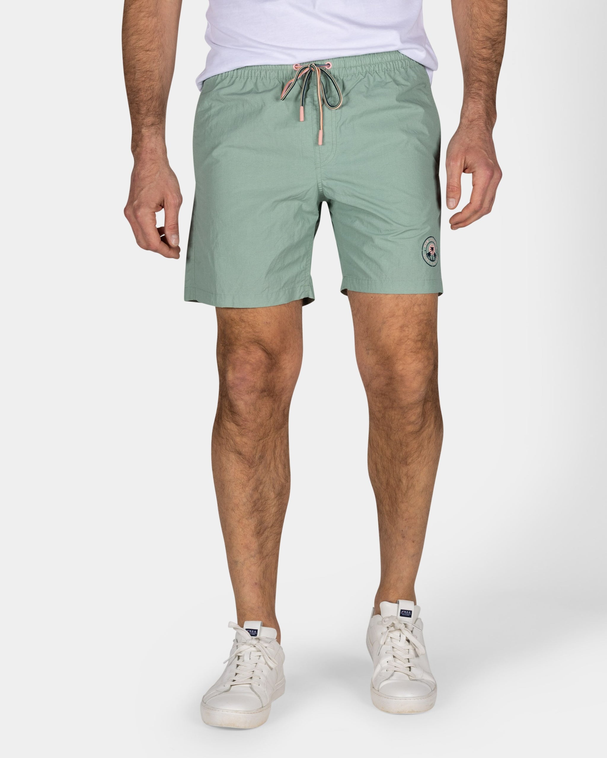 Groene effen zwembroek met lycra binnenbroek Groene effen zwembroek met lycra binnenbroek