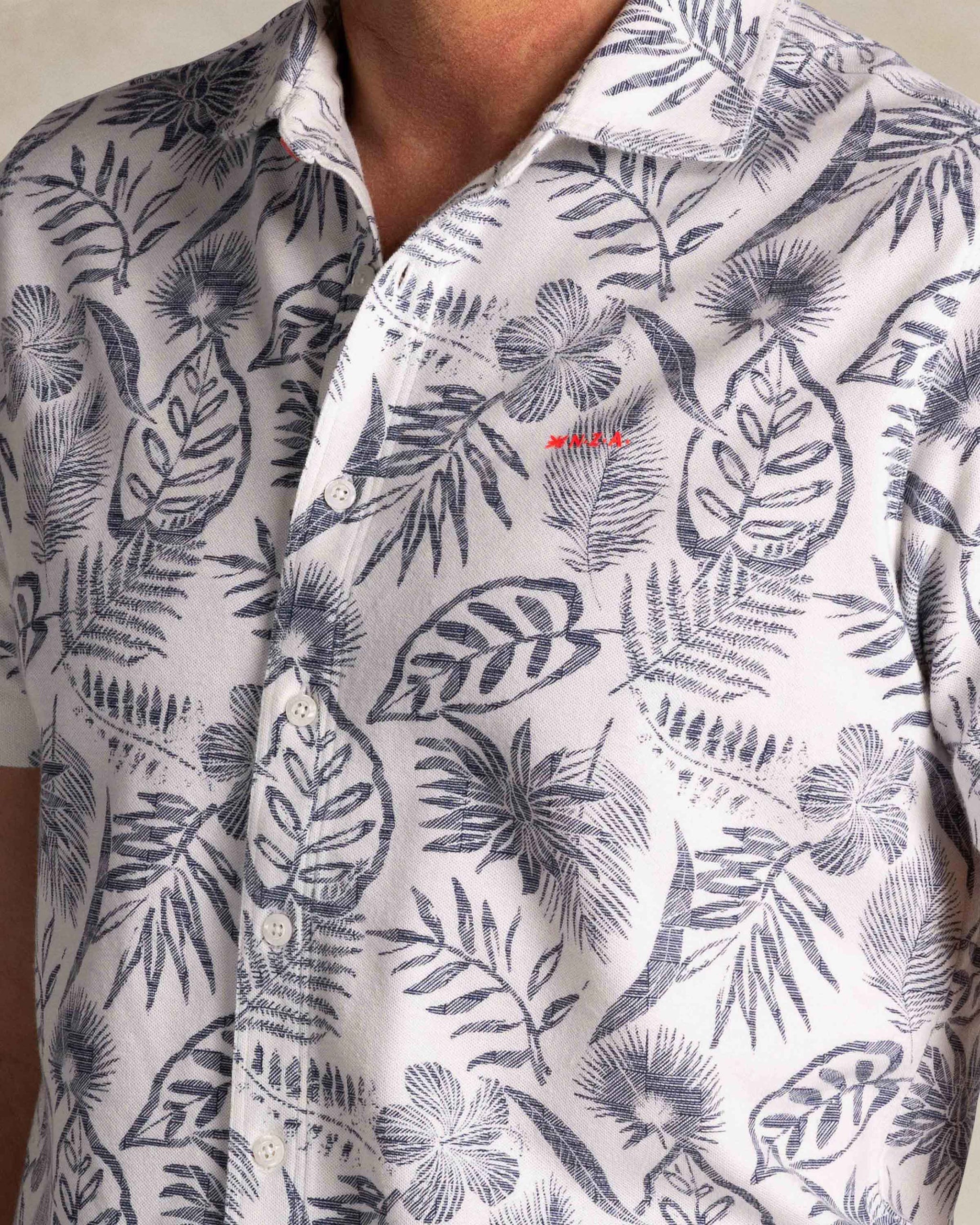 Beige shirt with navy floral print Beige shirt with navy floral print