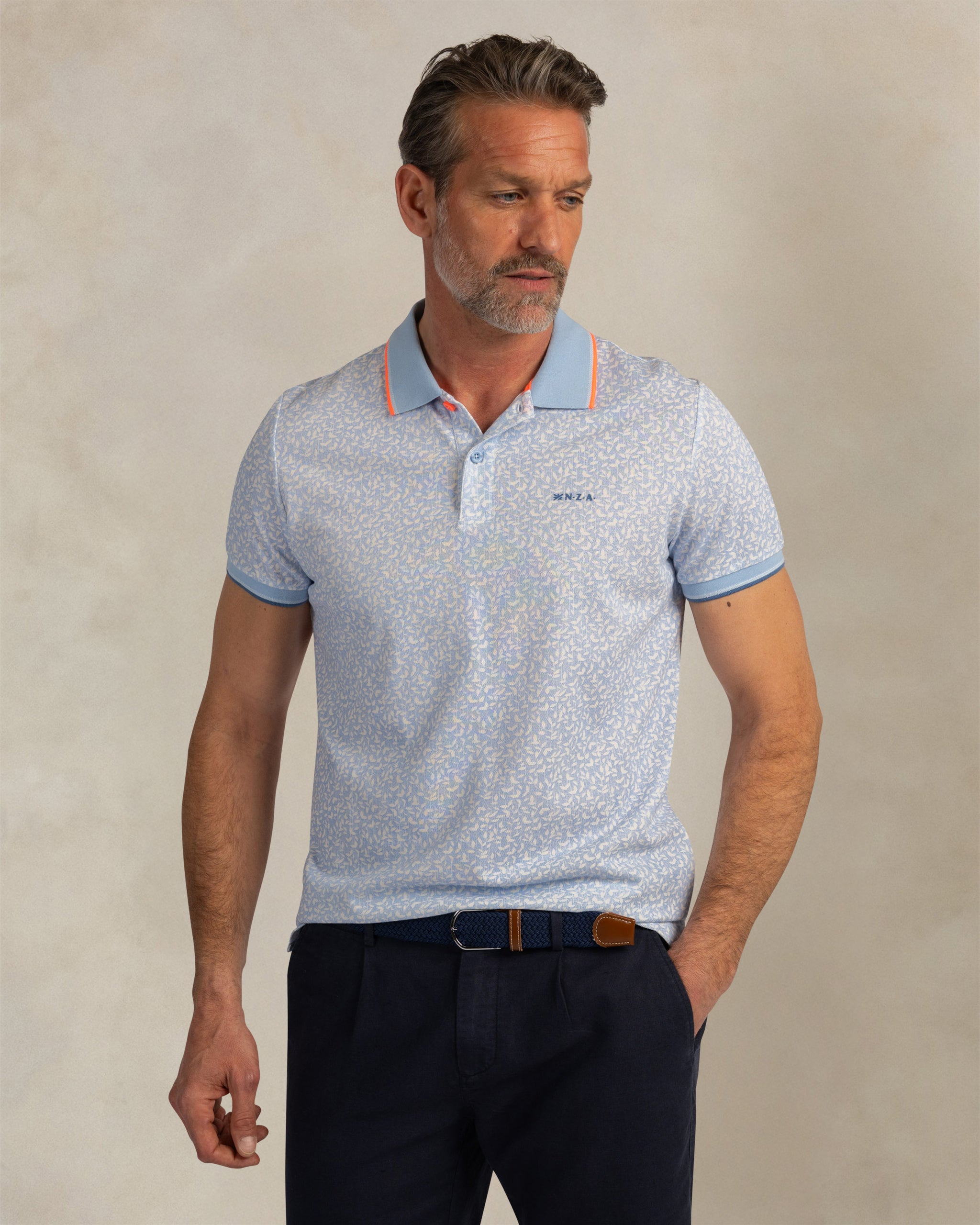 Polo imprimé en 100% coton bleu clair Polo imprimé en 100% coton bleu clair