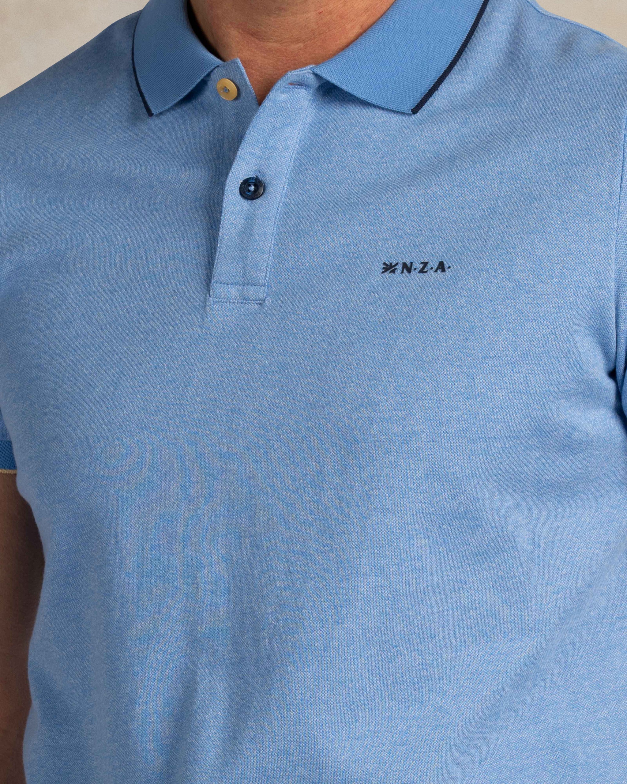 Lichtblauwe 100% katoenen polo Lichtblauwe 100% katoenen polo