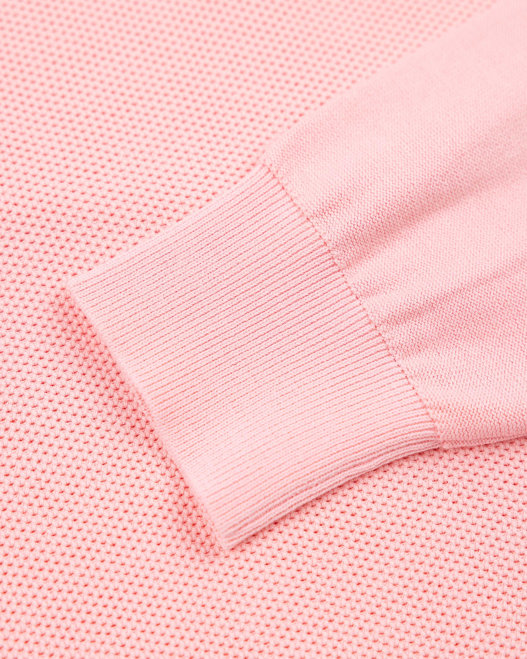 Suéter básico rosa pastel con cremallera media Suéter básico rosa pastel con cremallera media