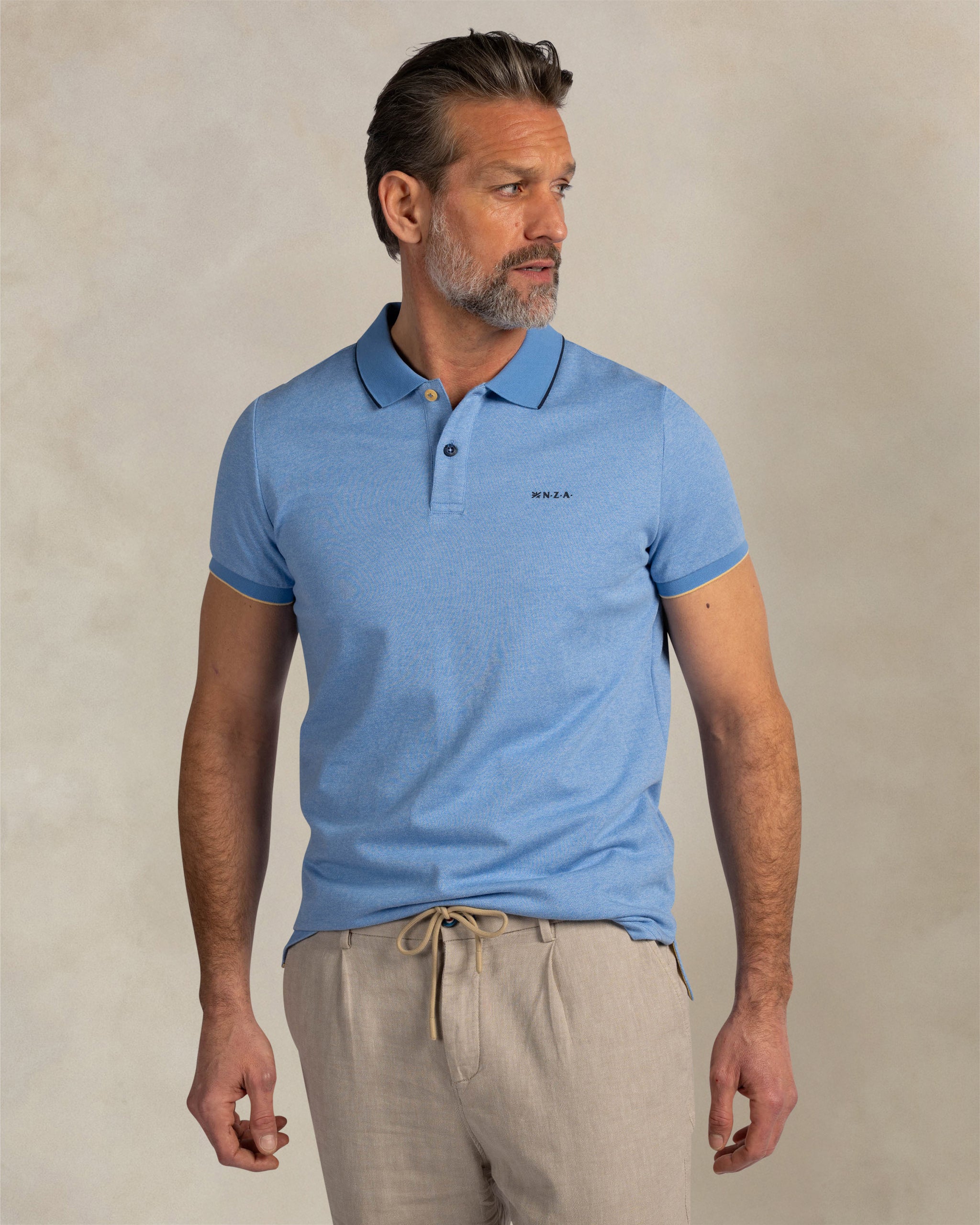 Lichtblauwe 100% katoenen polo Lichtblauwe 100% katoenen polo