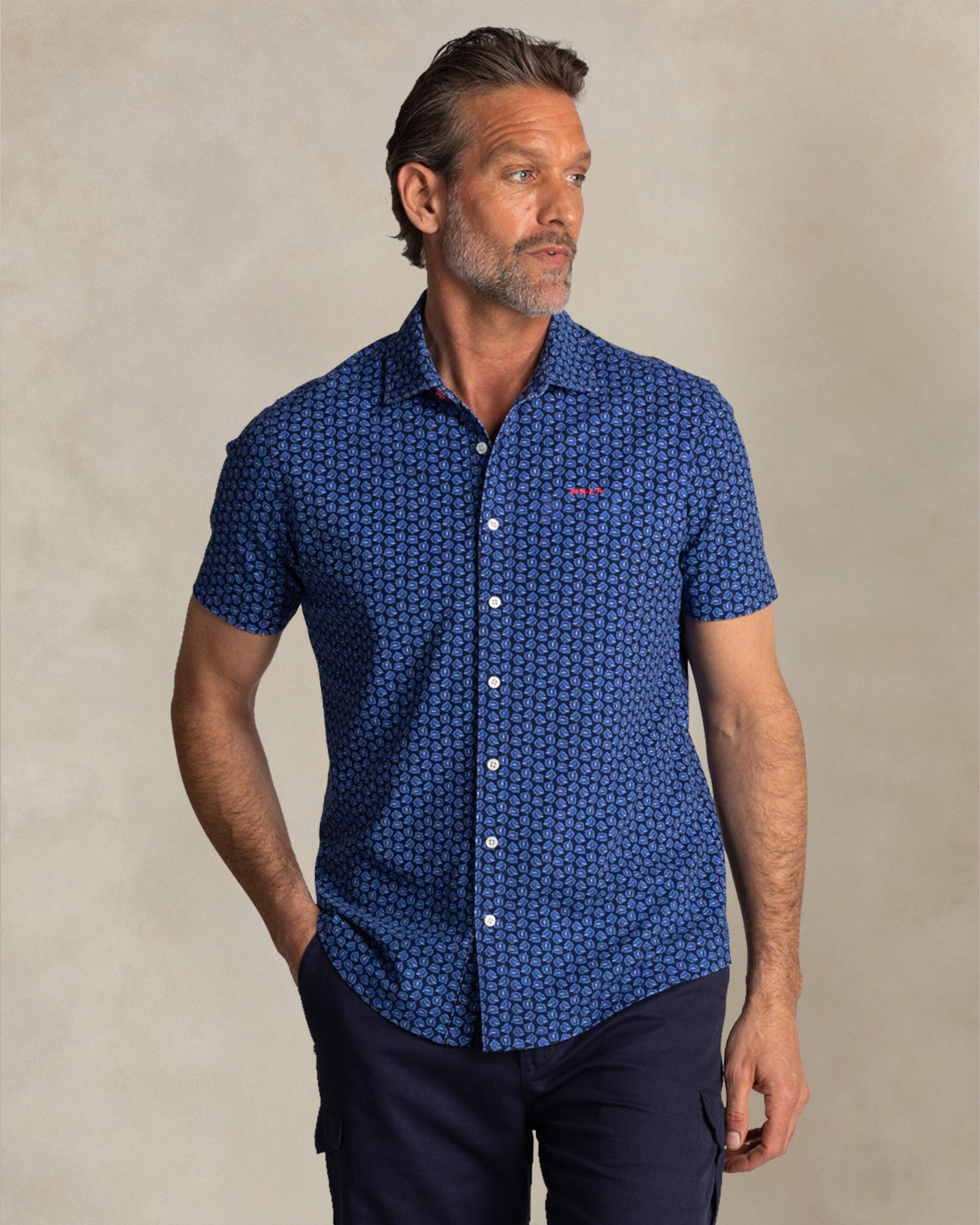 Blue shirt with small white dots Blue shirt with small white dots