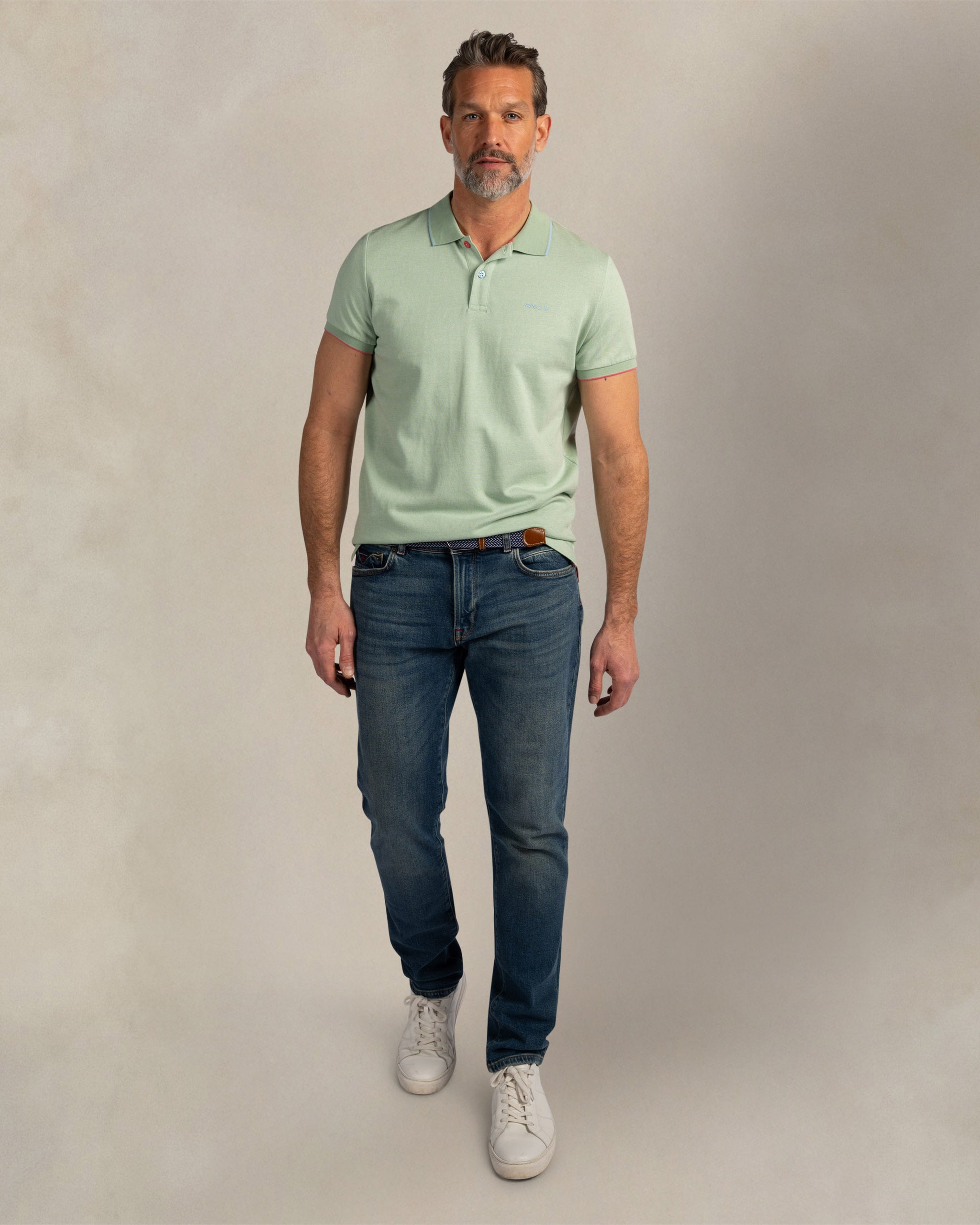 Lichtgroene 100% katoenen polo Lichtgroene 100% katoenen polo