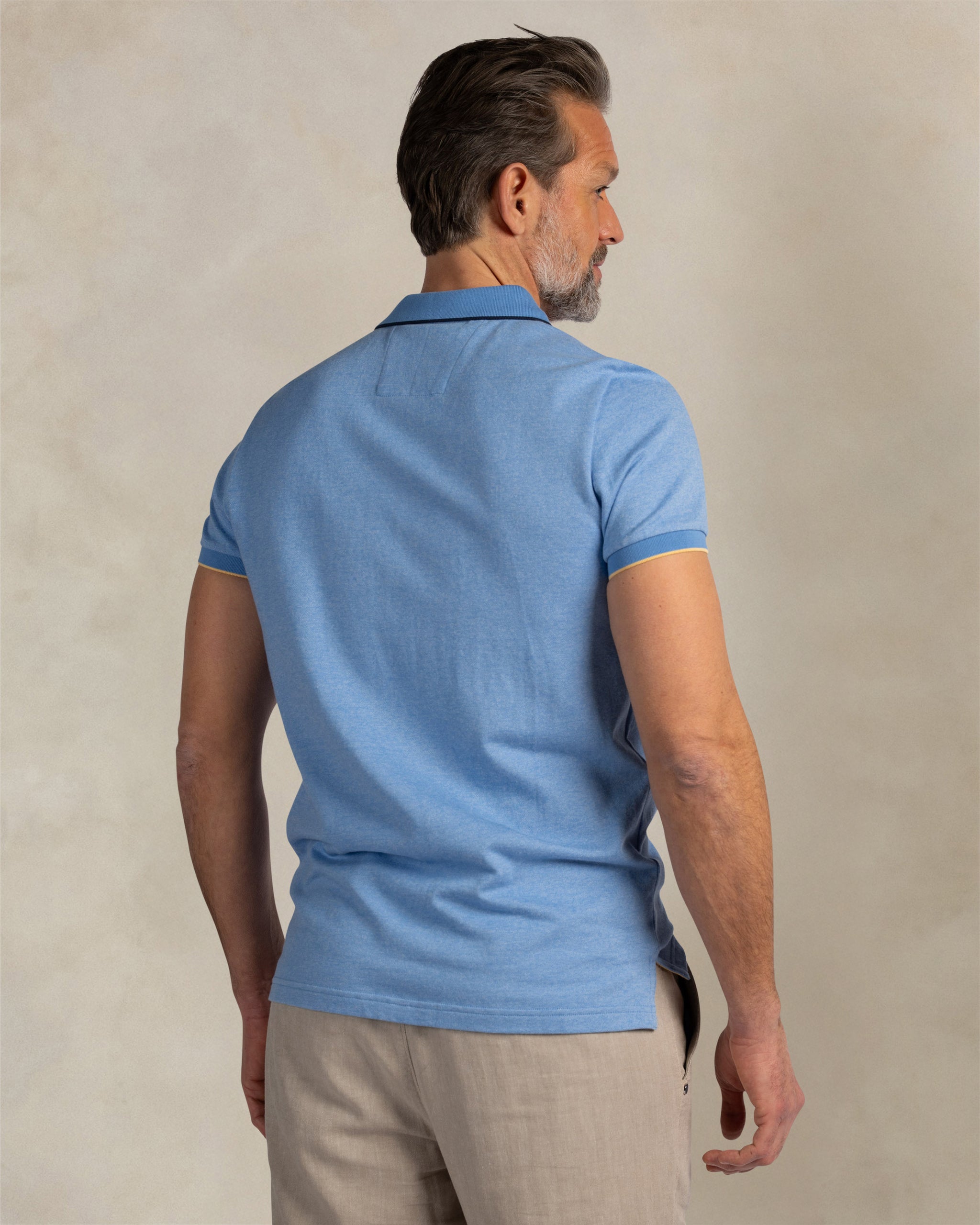 Lichtblauwe 100% katoenen polo Lichtblauwe 100% katoenen polo