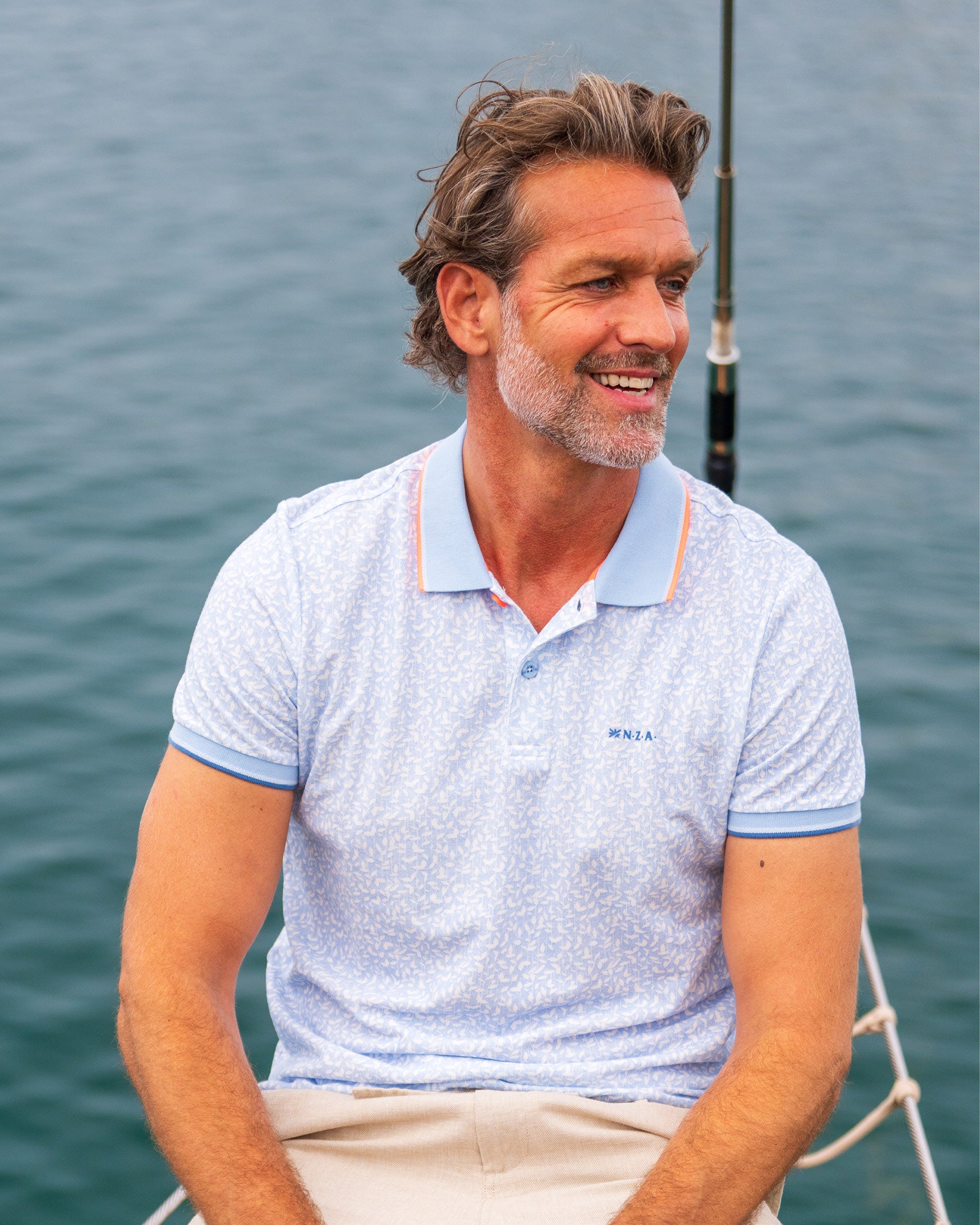 Polo imprimé en 100% coton bleu clair Polo imprimé en 100% coton bleu clair