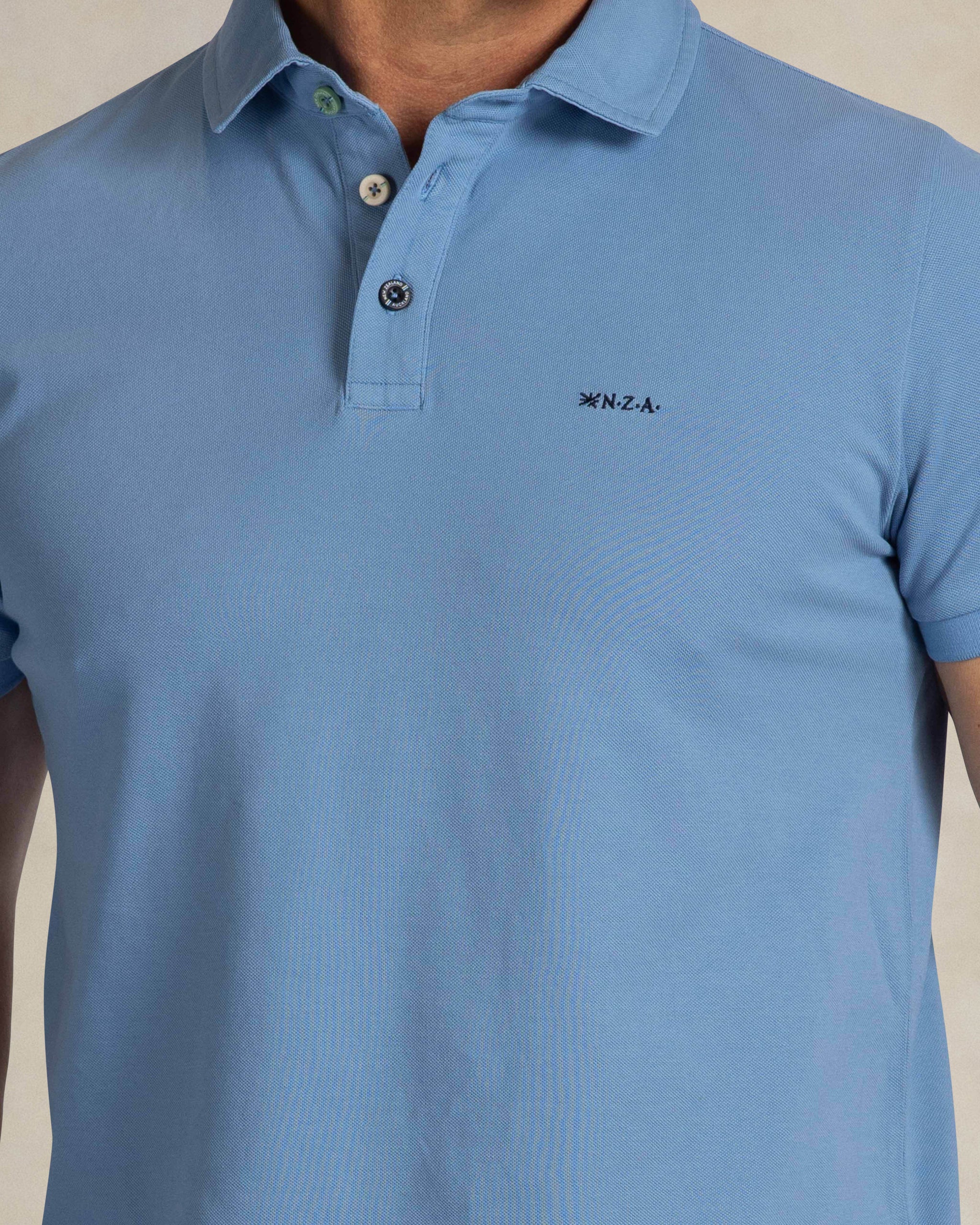 Lichtblauwe katoenen stretch polo Lichtblauwe katoenen stretch polo