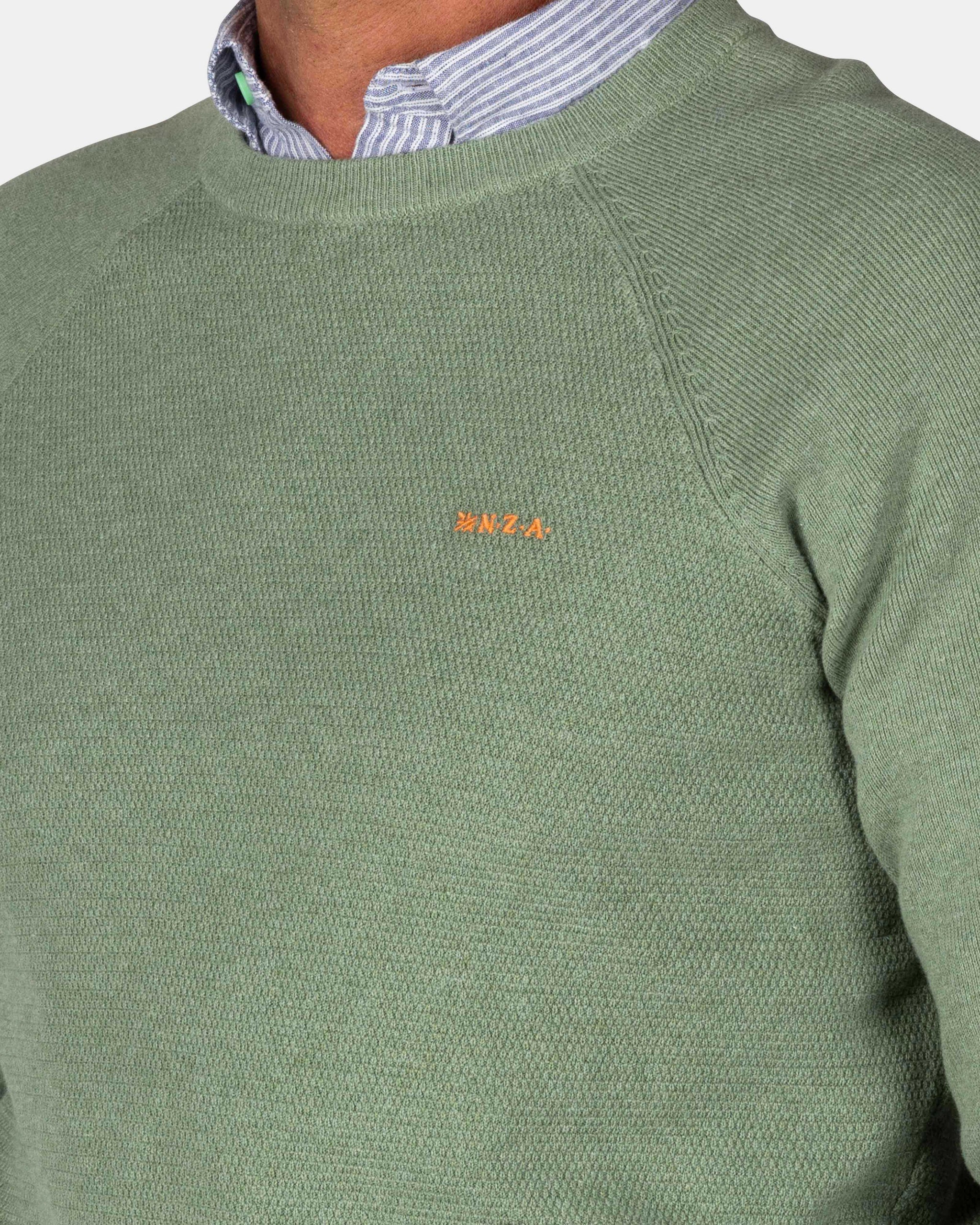 Groene effen pullover met ronde hals Groene effen pullover met ronde hals