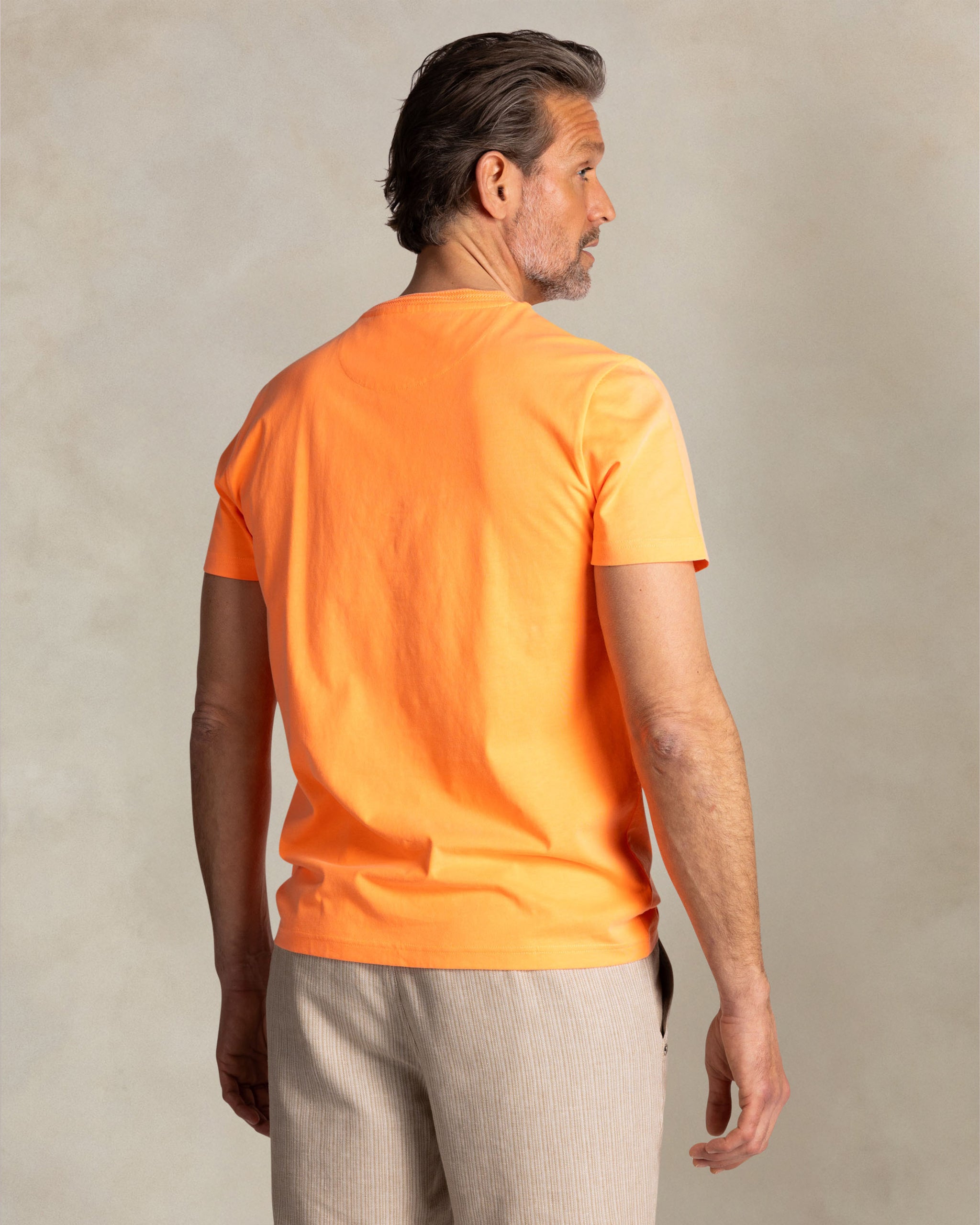 Camiseta lisa naranja de algodón con cuello redondo Camiseta lisa naranja de algodón con cuello redondo