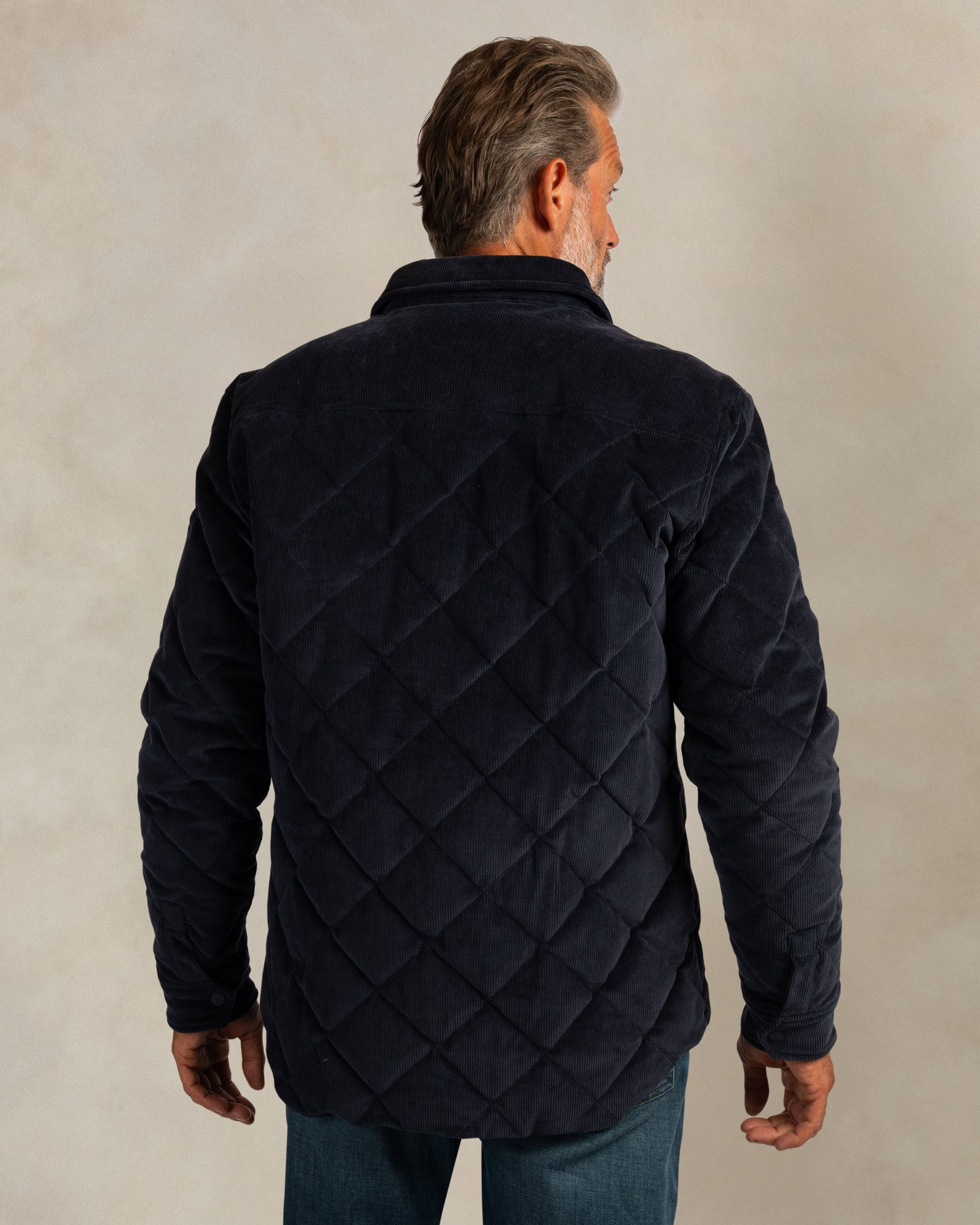Donkerblauw corduroy gewatteerde jas Donkerblauw corduroy gewatteerde jas