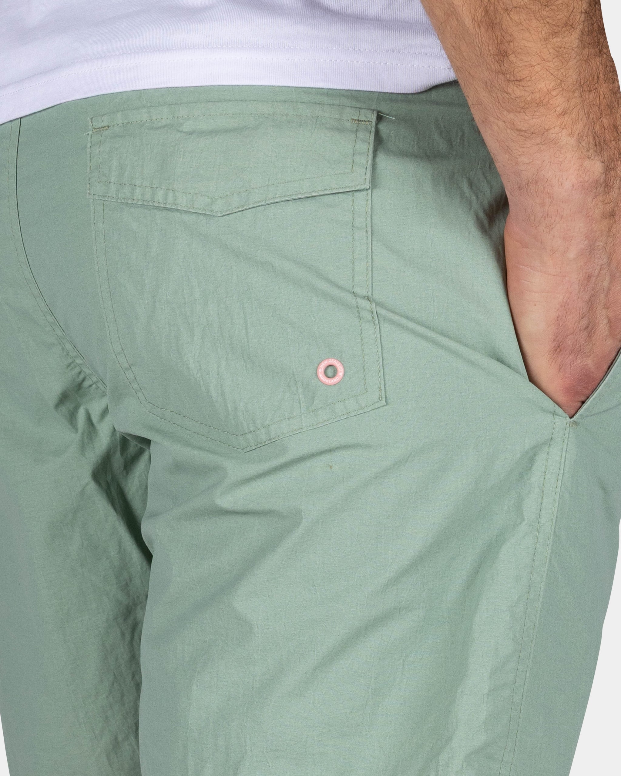 Groene effen zwembroek met lycra binnenbroek Groene effen zwembroek met lycra binnenbroek