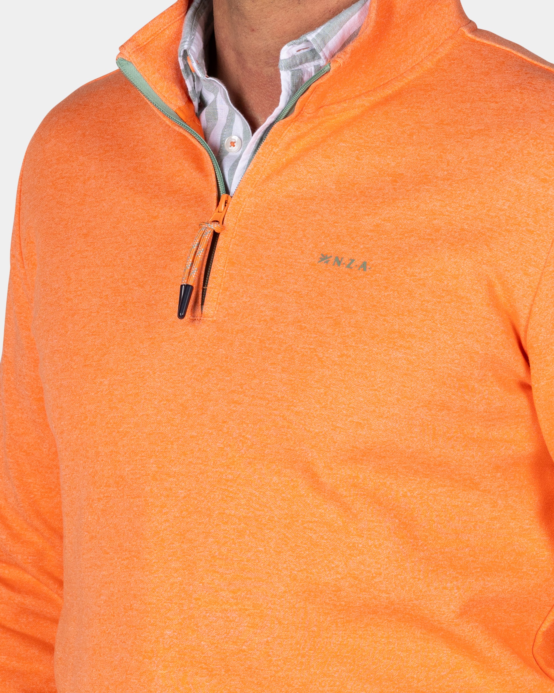 Oranje trui met halve rits Oranje trui met halve rits