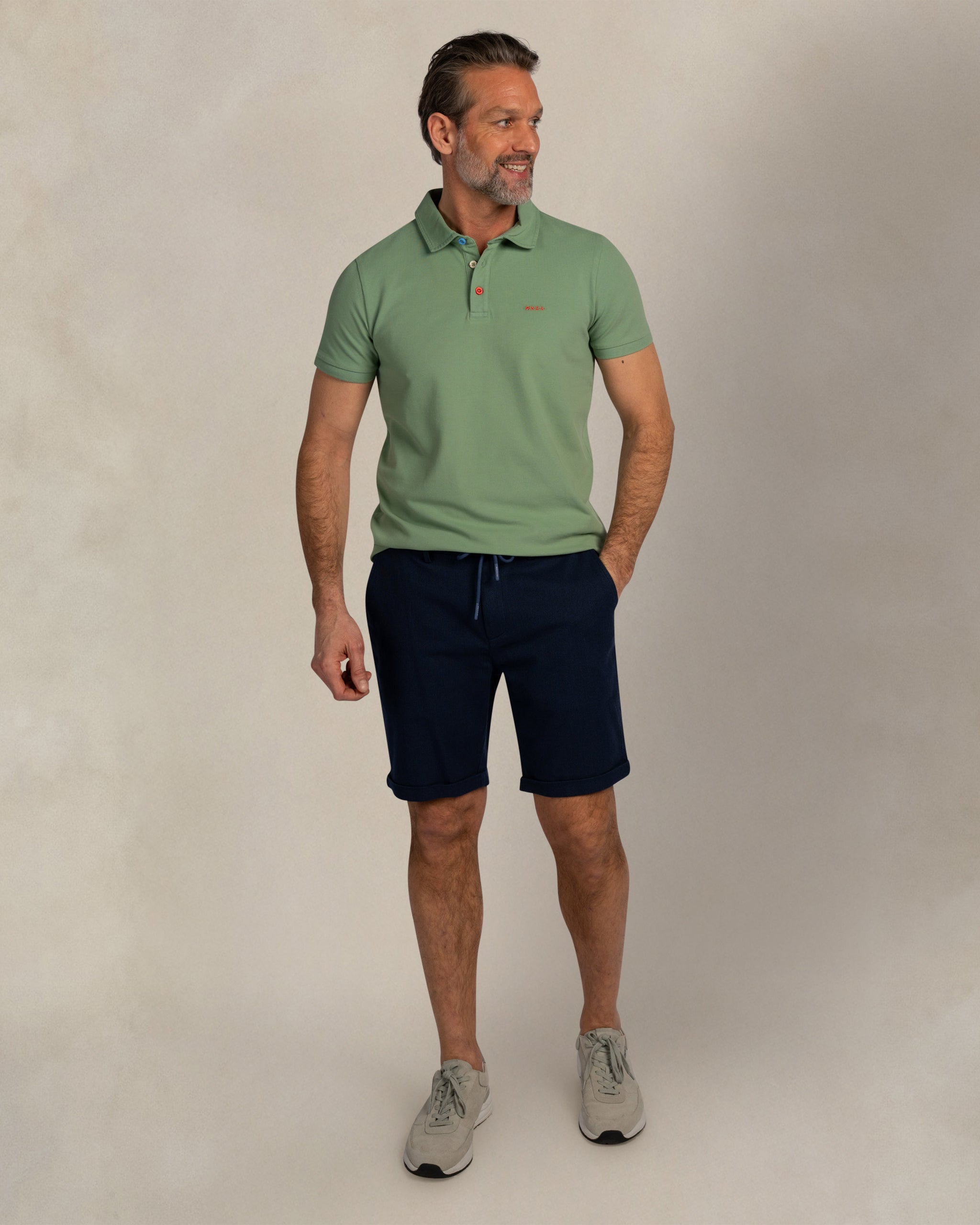 Polo de algodón elástico verde claro Polo de algodón elástico verde claro