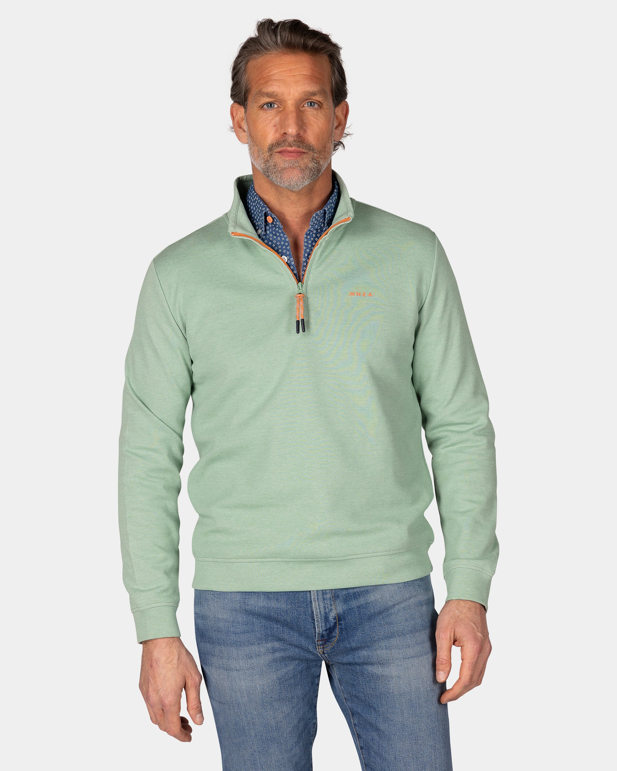 Pull vert avec demi-fermeture éclair Pull vert avec demi-fermeture éclair