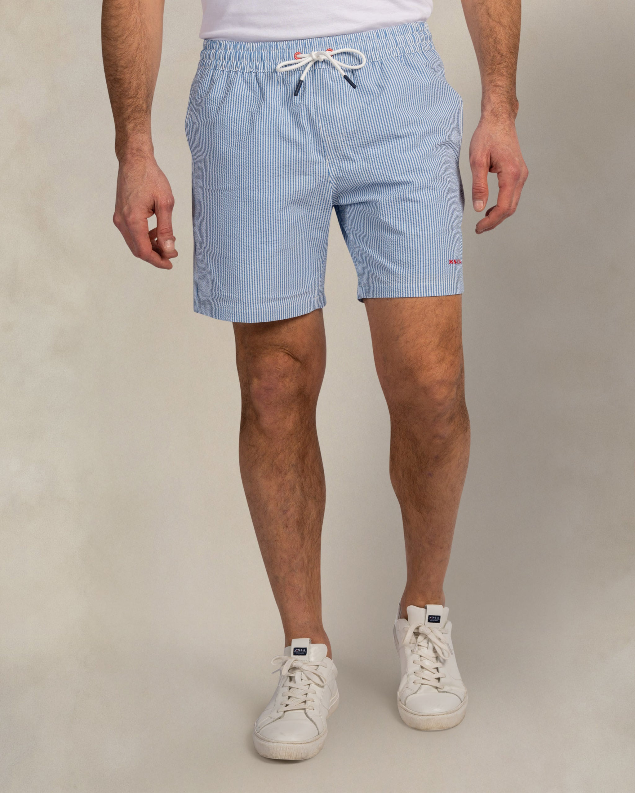 Light blue swim shorts with stripe Light blue swim shorts with stripe