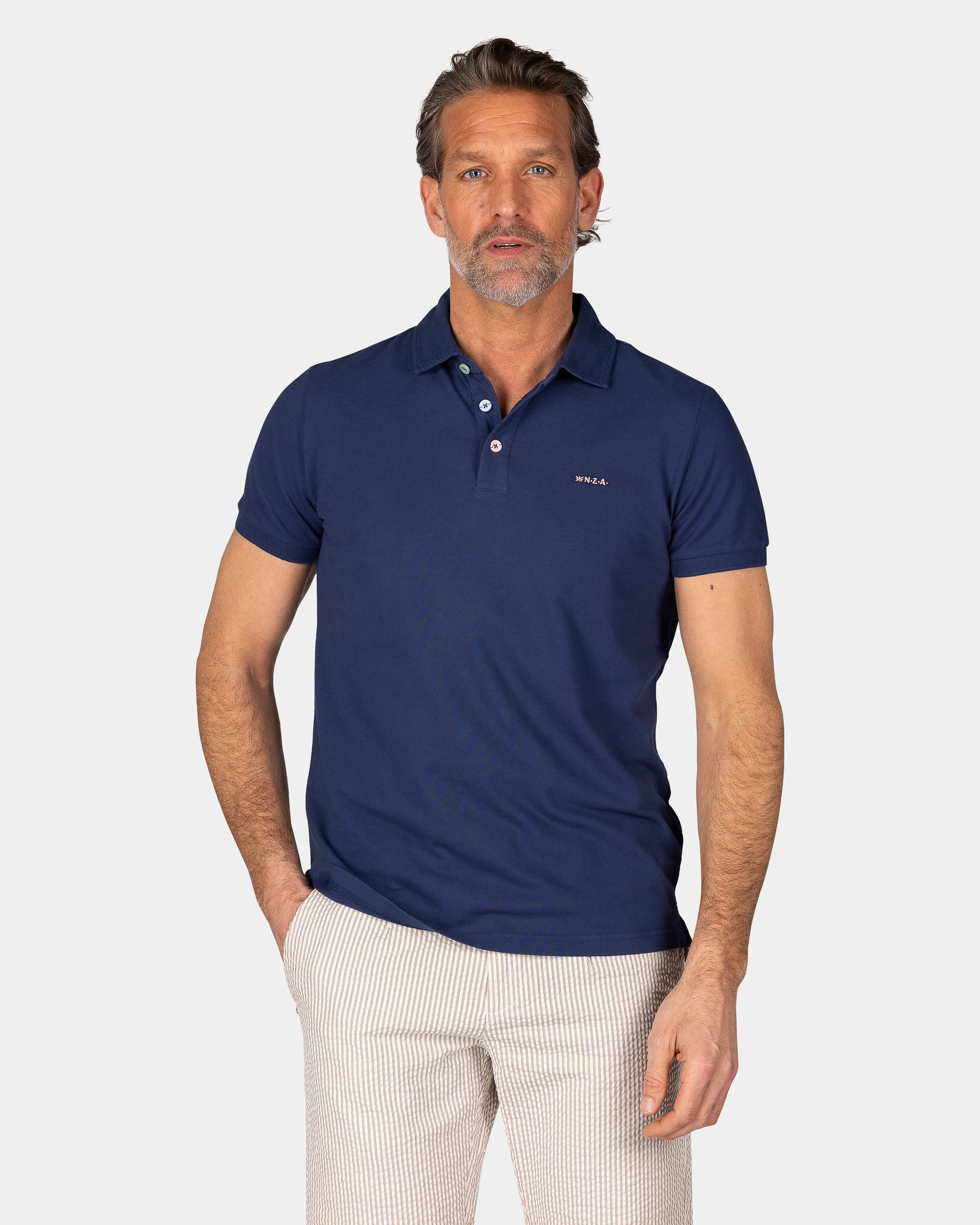 Polo liso de algodón azul Polo liso de algodón azul