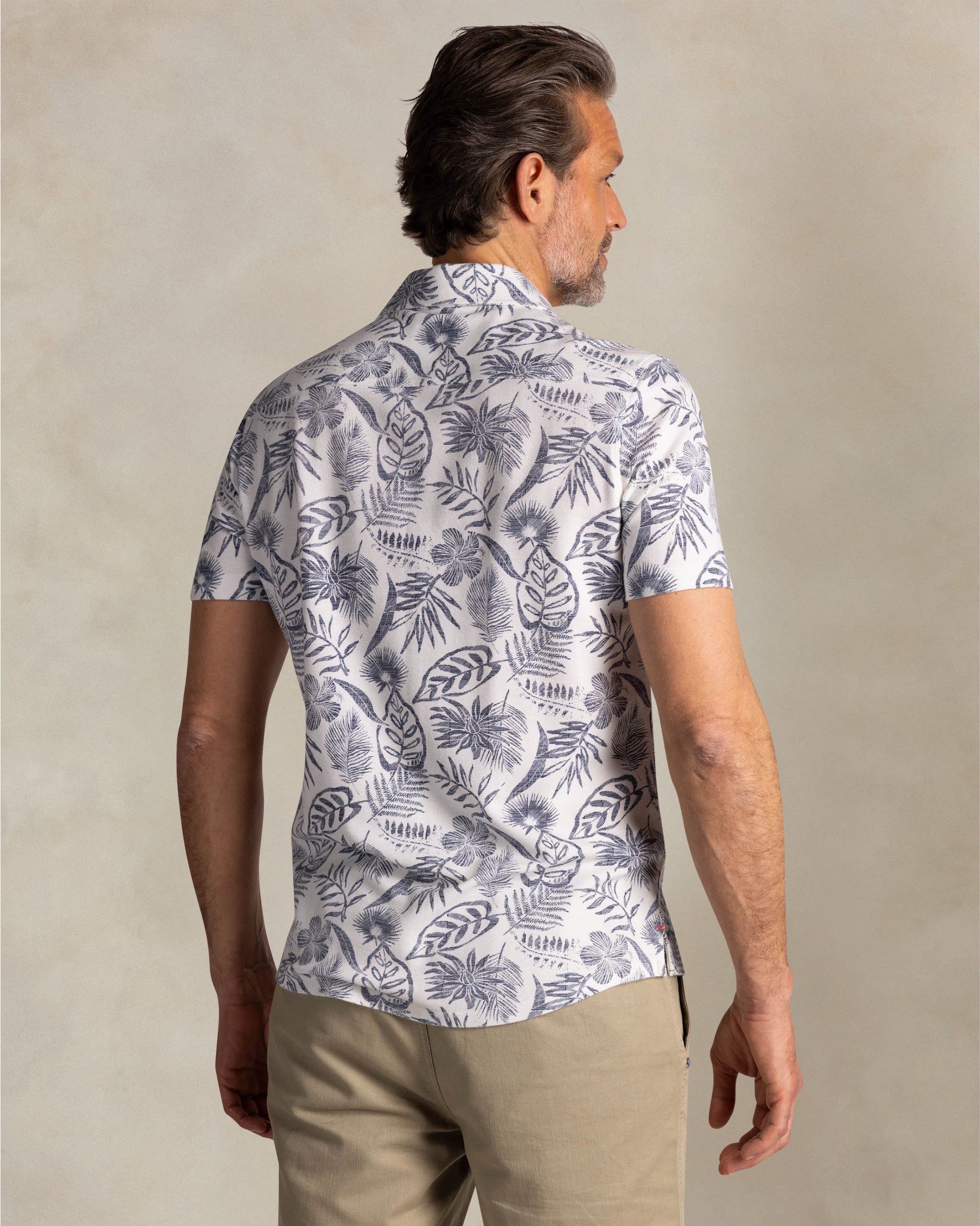 Beige shirt with navy floral print Beige shirt with navy floral print